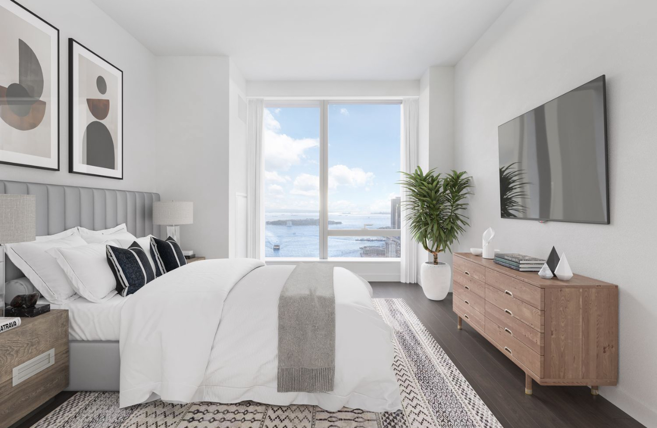 252 South Street, Unit 53B Manhattan, NY 10002 - Photo 7 of 24 a spacious bedroom with a large bed and a large window