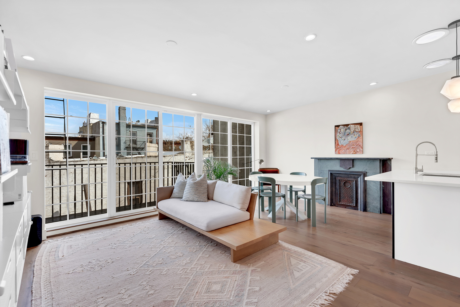 541 Madison Street, Unit 4 Brooklyn, NY 11221 - Photo 2 of 9 a living room with furniture and a table