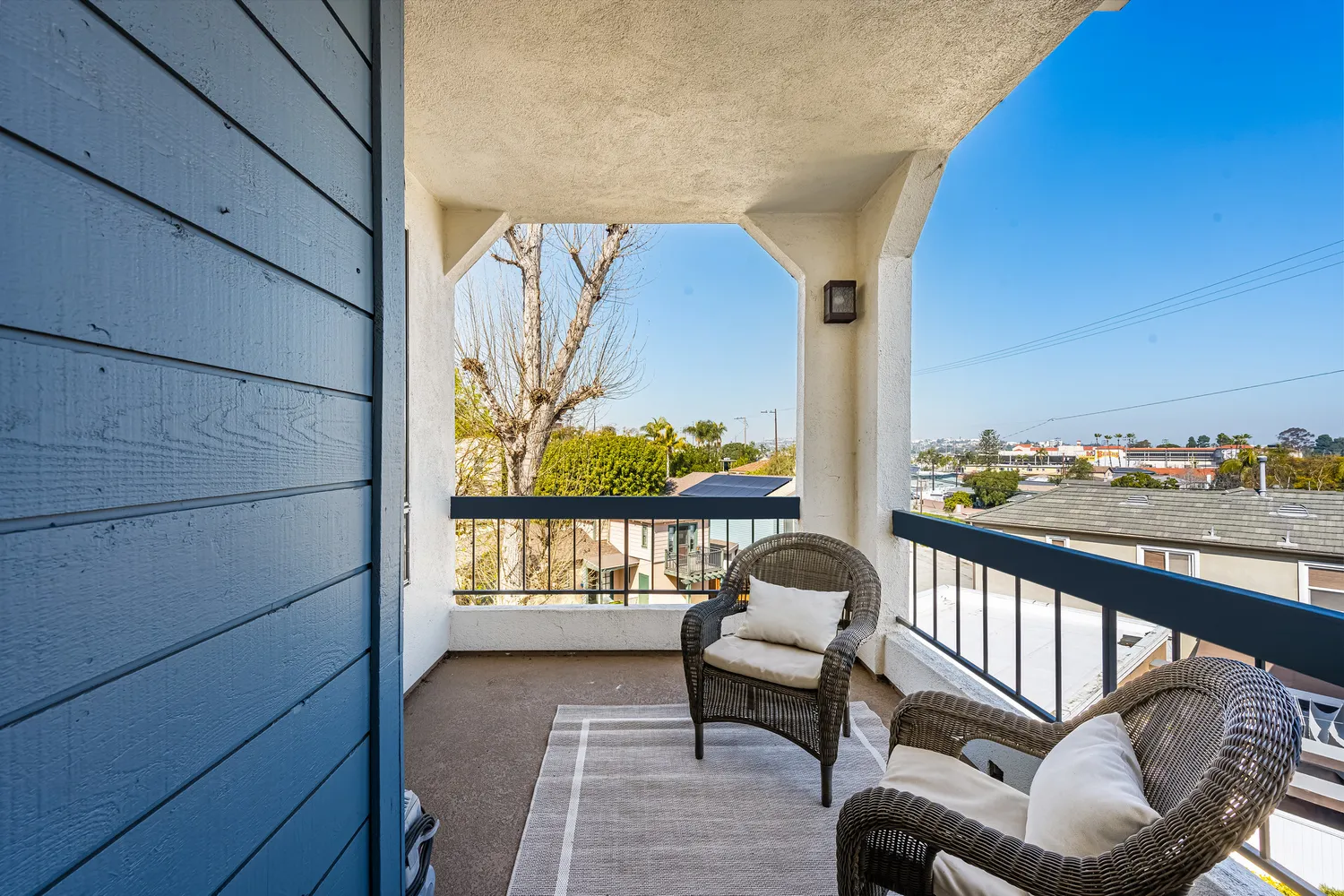 a swimming pool with outdoor seating and yard