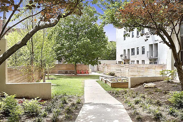 204 Huntington Street, Unit 2I Brooklyn, NY 11231 - Photo 5 of 7 a view of a house with a yard