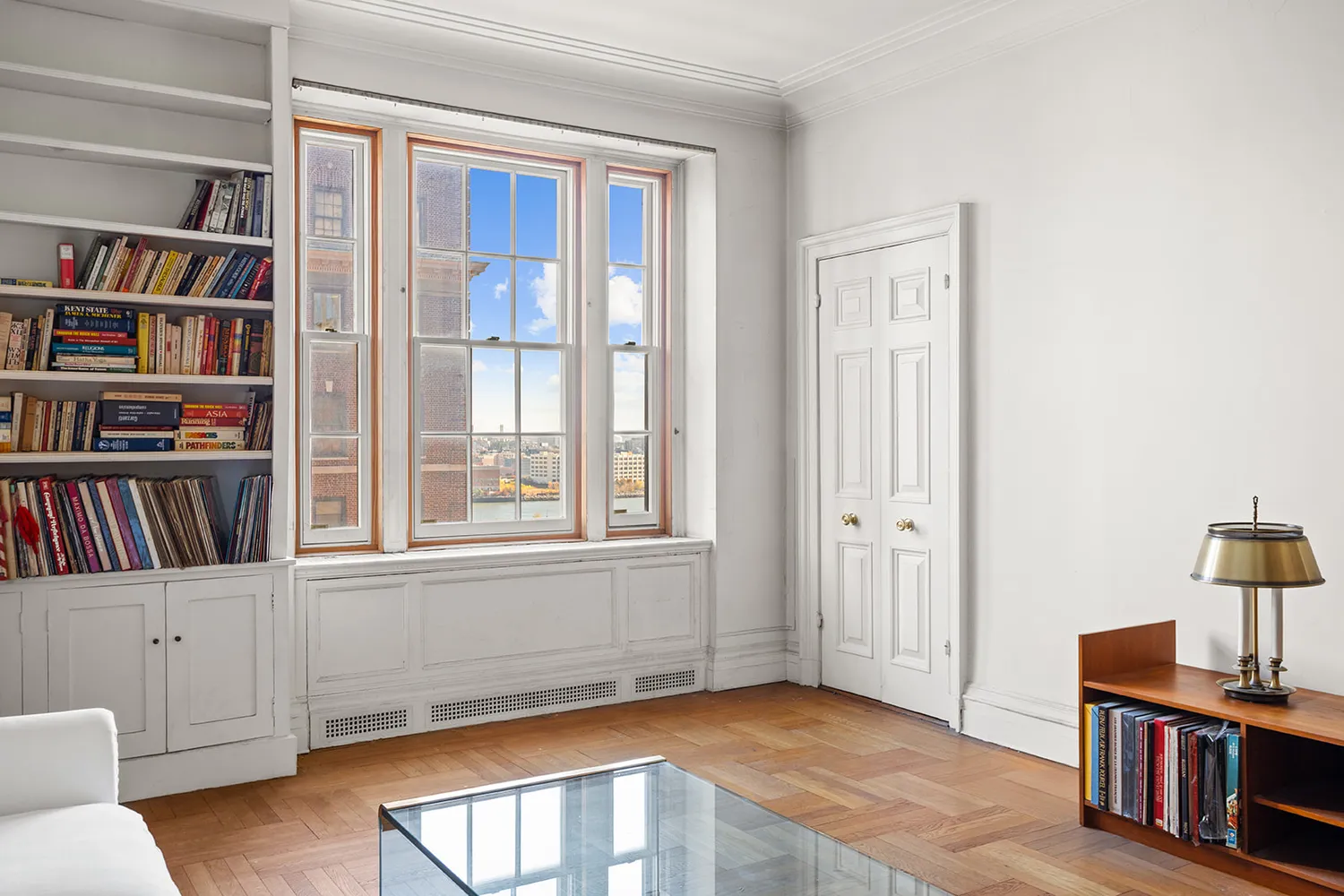 a view of an empty room with shelves