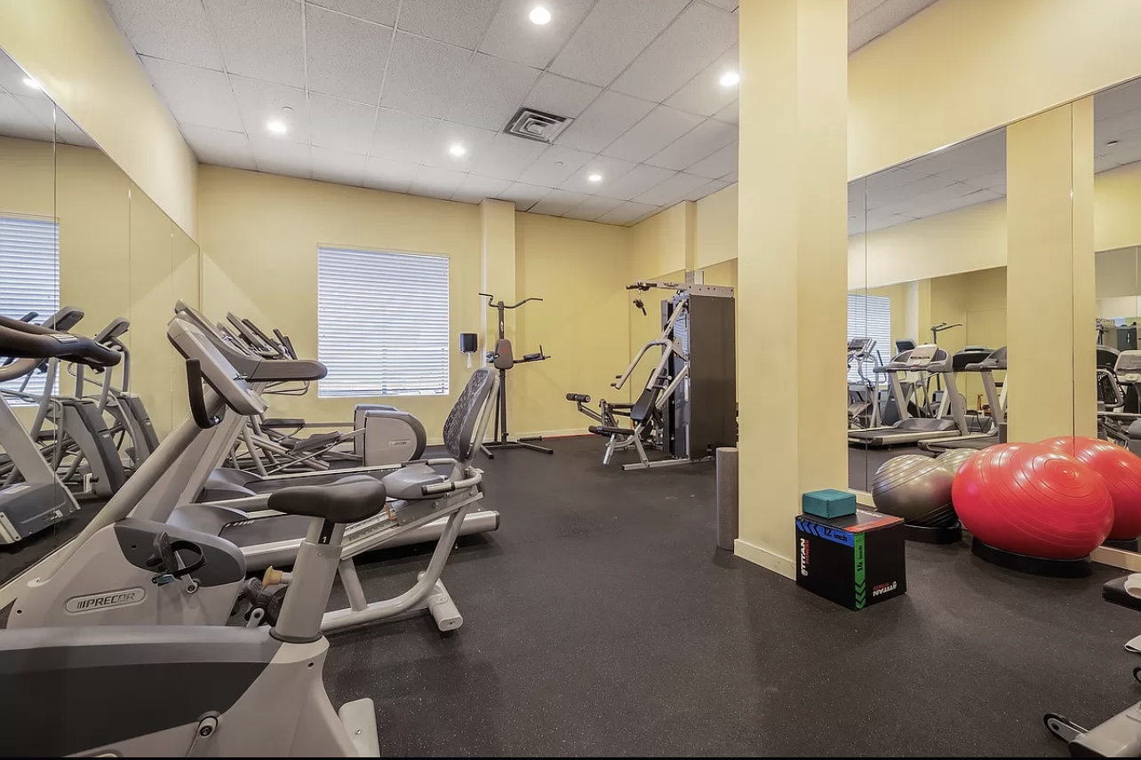 234 West 148th Street, Unit 5D Manhattan, NY 10039 - Photo 12 of 16 a room with gym equipment