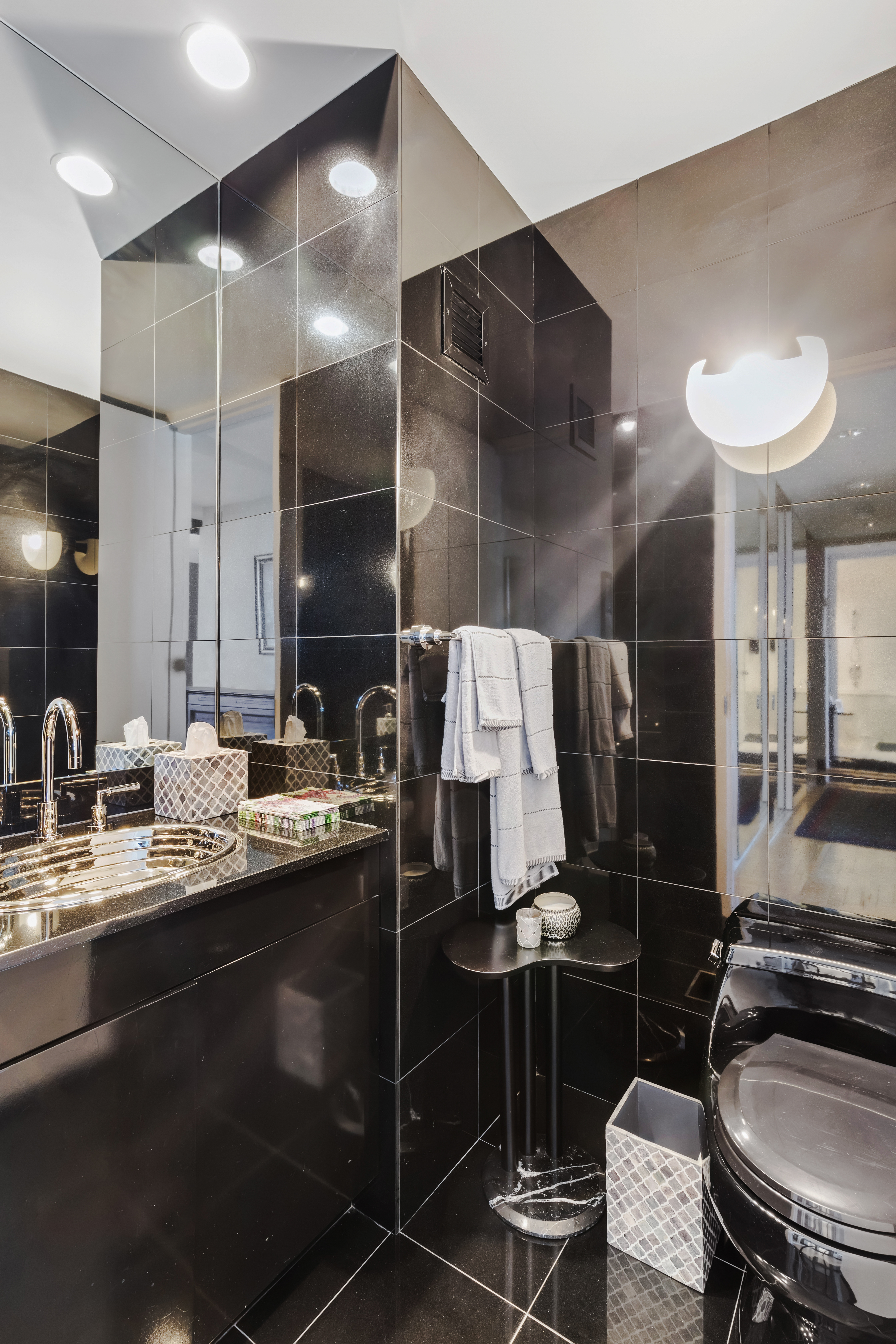 160 West 66th Street, Unit 42AB Manhattan, NY 10023 - Photo 7 of 15 a kitchen with a sink and cabinets