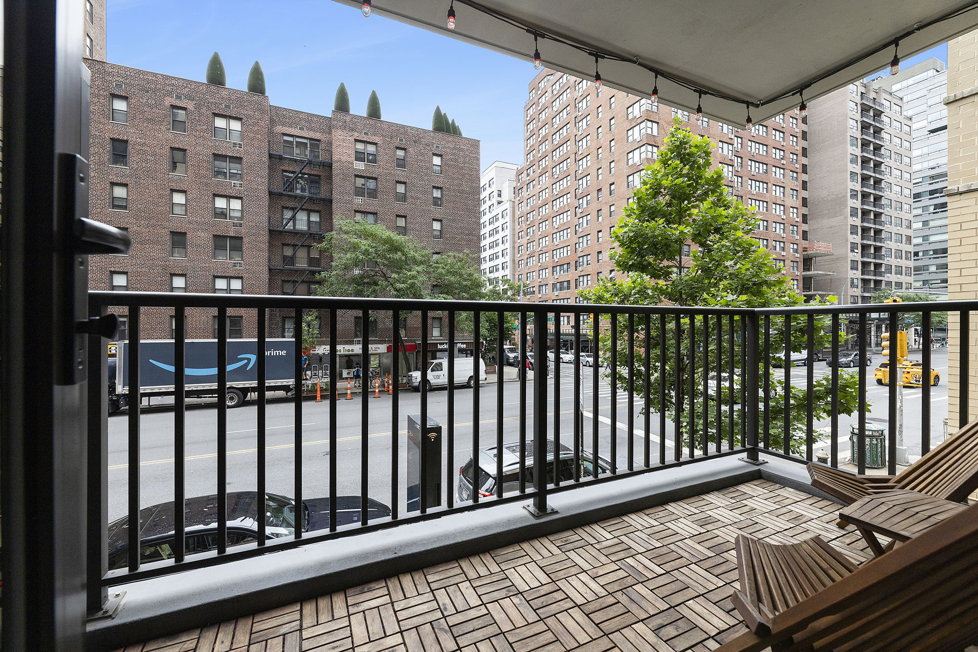 145 East 15th Street, Unit 2T Manhattan, NY 10003 - Photo 3 of 10 a view of balcony with wooden floor
