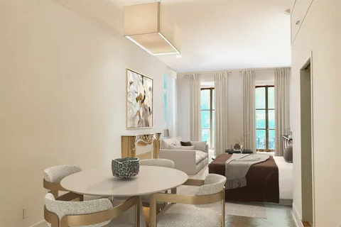 a view of a dining room with furniture and window