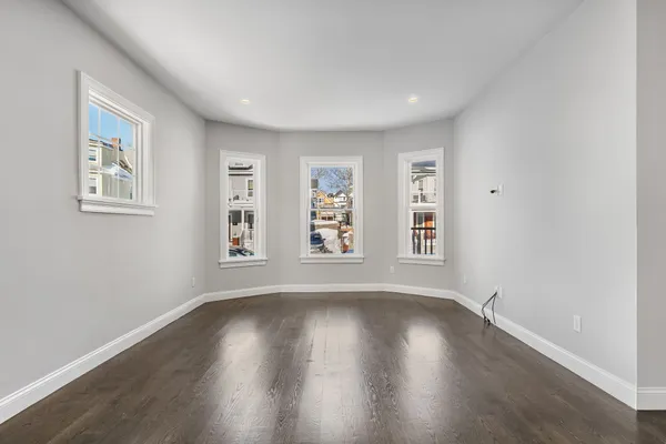 a view of livingroom with hardwood floor and window