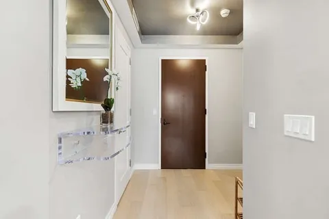 a bathroom with a tub and shower