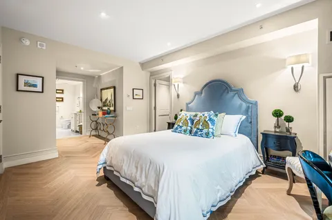 a bedroom with a bed and closet