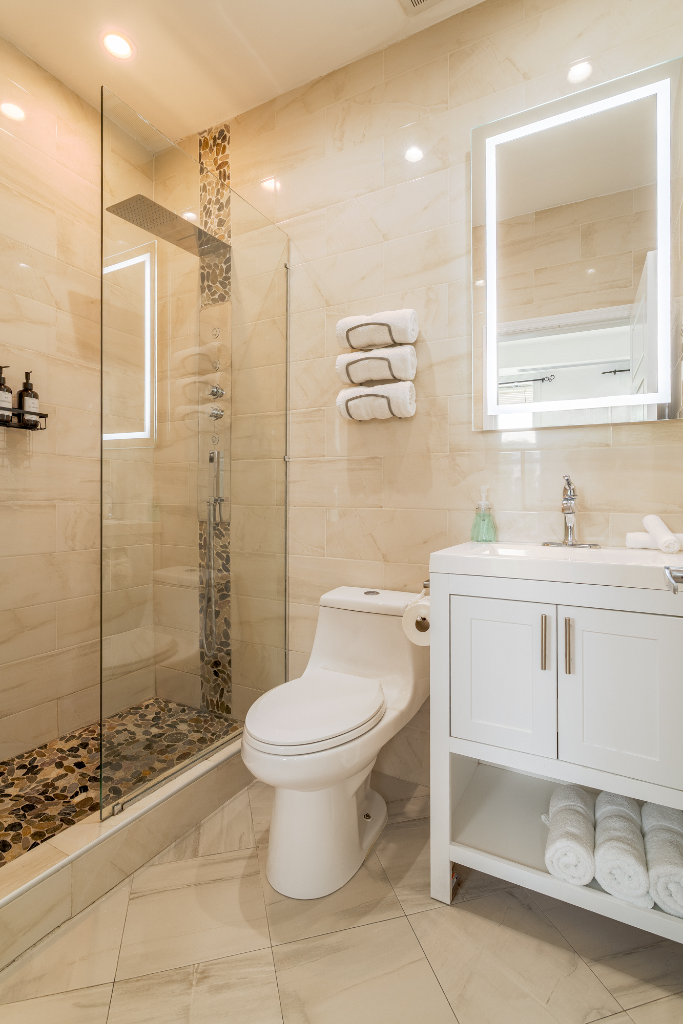 616 MacDonough Street, Unit 2 Brooklyn, NY 11233 - Photo 8 of 12 a bathroom with a sink toilet and shower