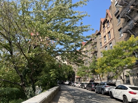 834 Riverside Drive, Unit E6 Manhattan, NY 10032 - Photo 7 of 22 a view of street with parked cars