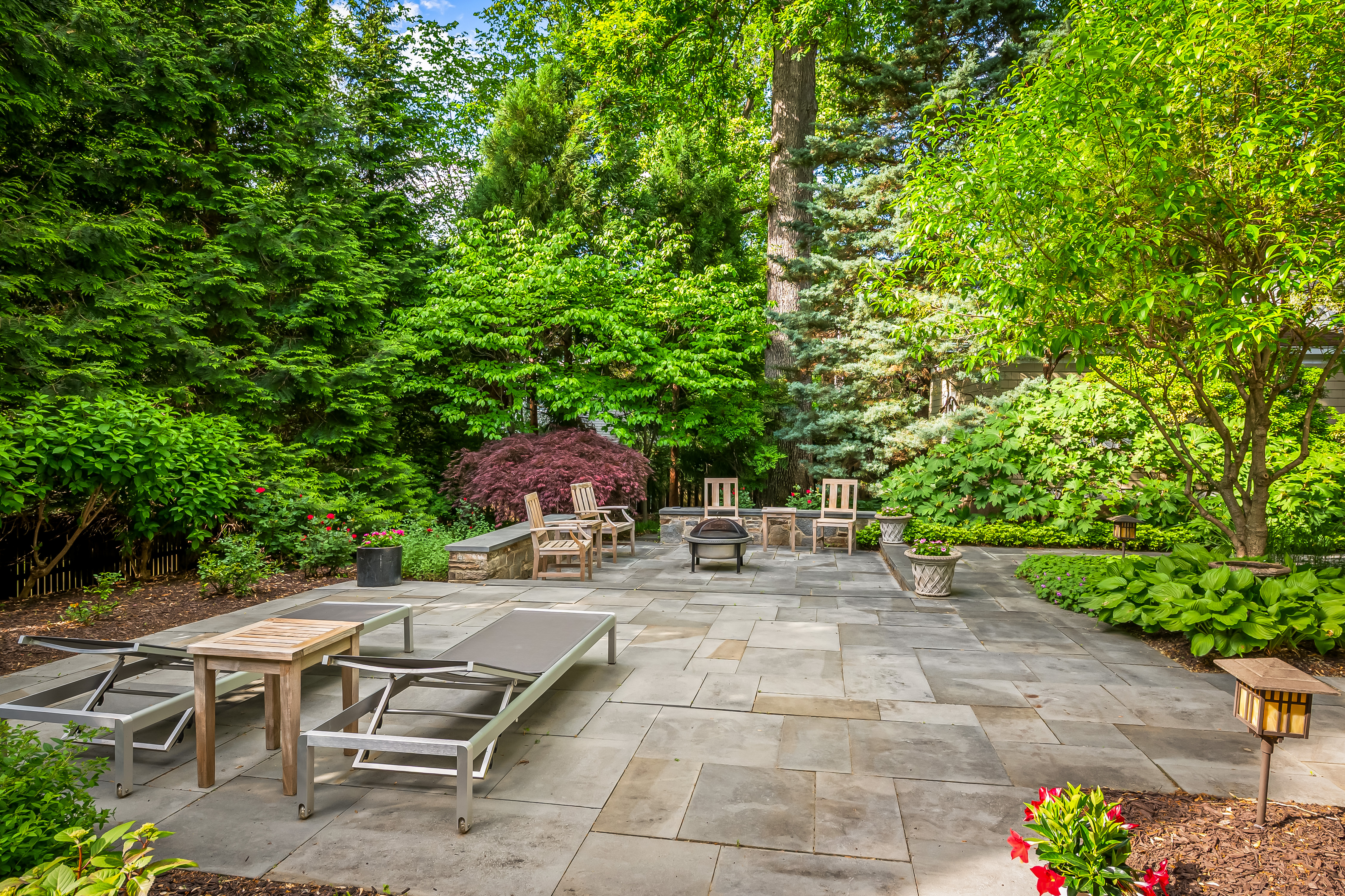6 Elmhurst Road Baltimore, MD 21210 - Photo 95 of 100 a view of a patio with table and chairs and potted plants