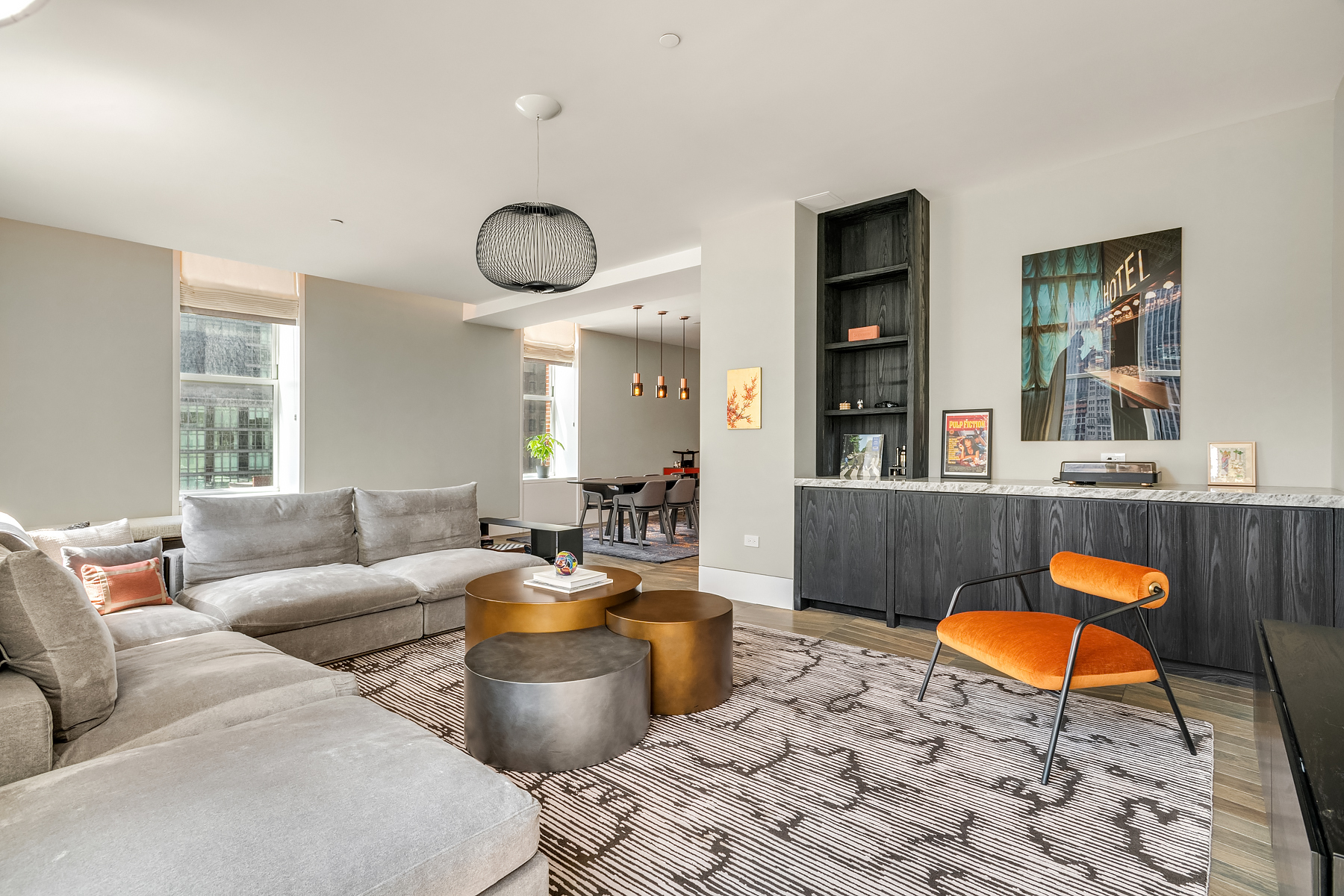 49 Chambers Street, Unit 11D Manhattan, NY 10007 - Photo 2 of 30 a living room with furniture a rug and a window