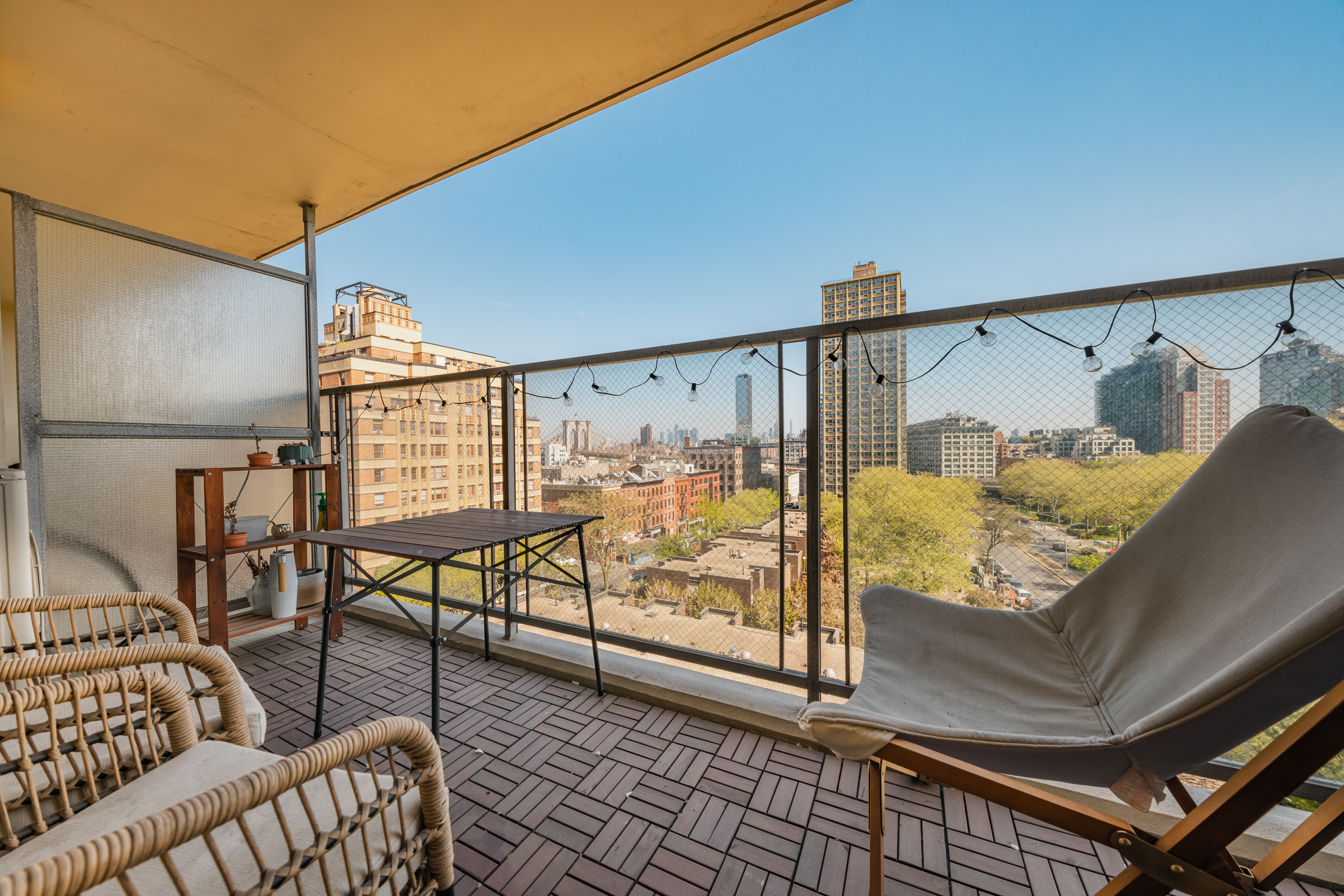 75 Henry Street, Unit 6D Brooklyn, NY 11201 - Photo 8 of 11 a bed room with a bed and a chair