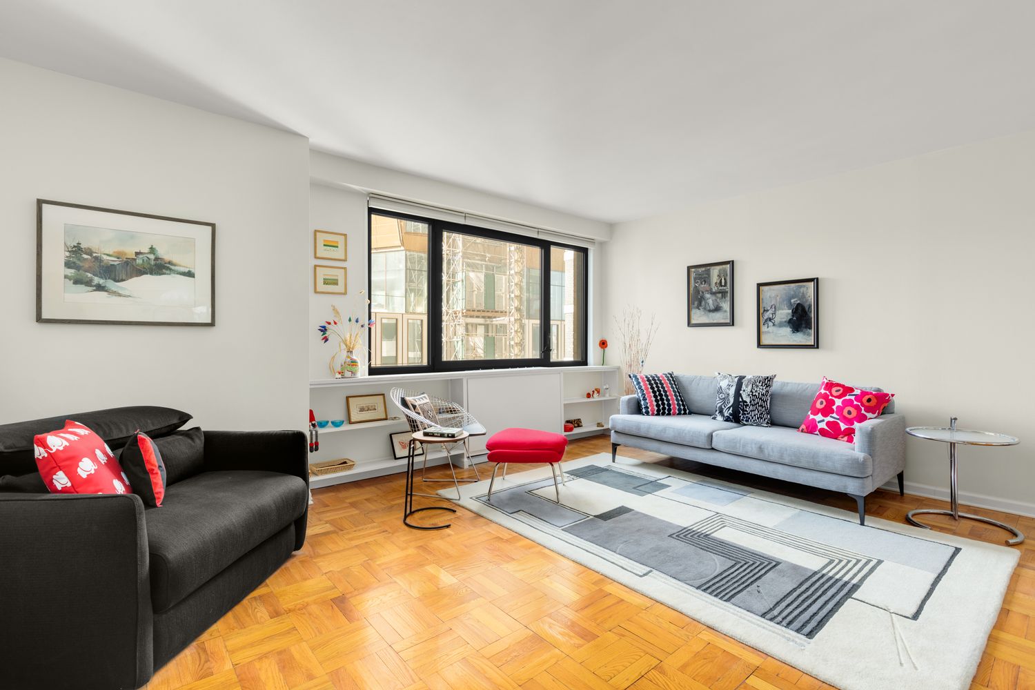 a living room with furniture and window