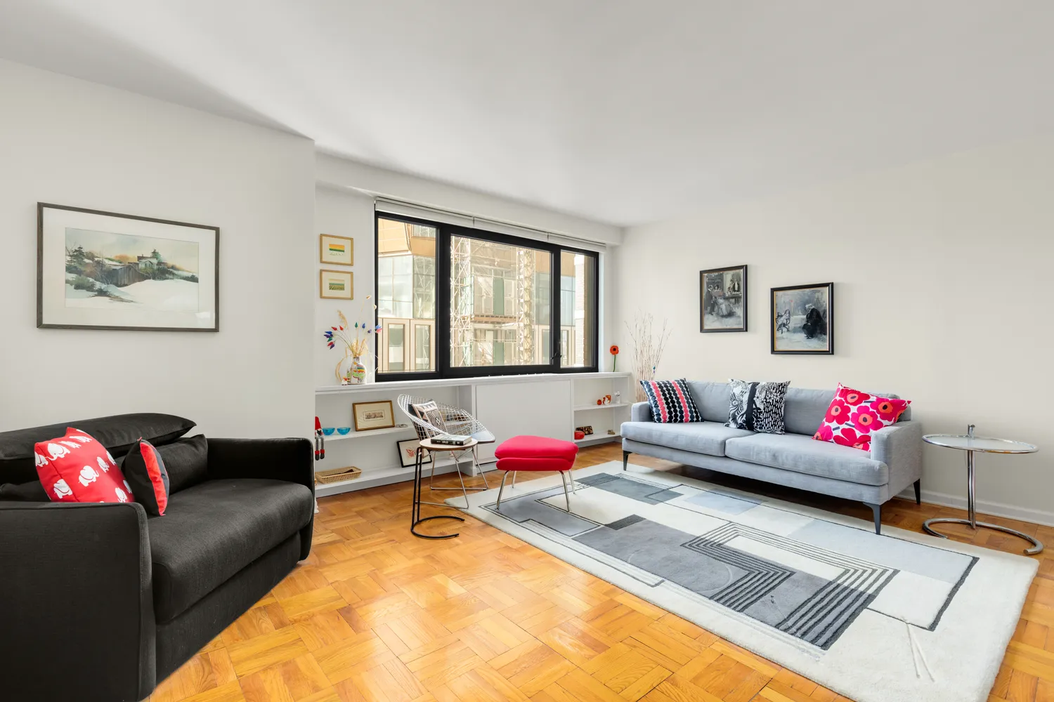 a living room with furniture and window