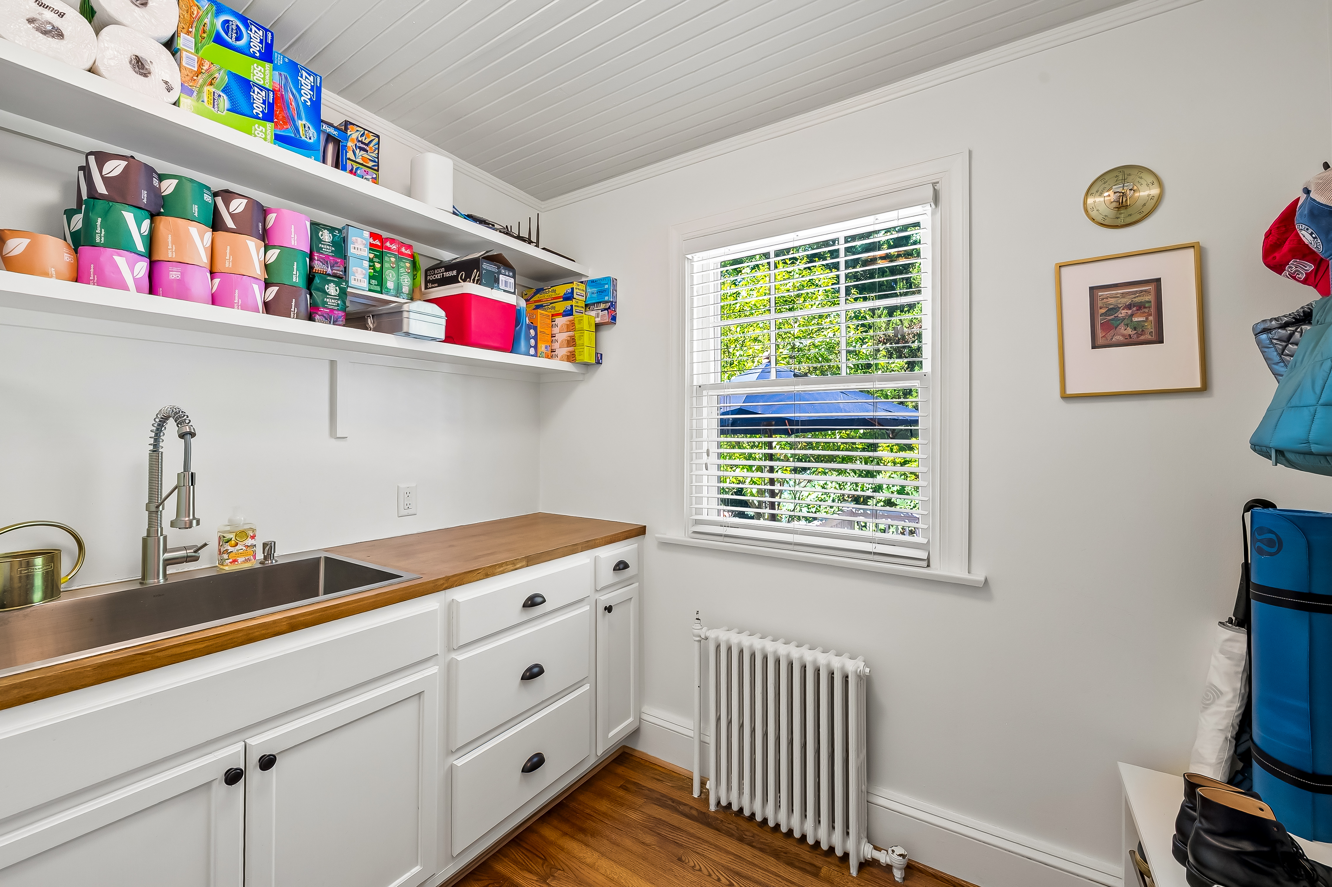 6 Elmhurst Road Baltimore, MD 21210 - Photo 54 of 100 a kitchen with stainless steel appliances cabinets and a window
