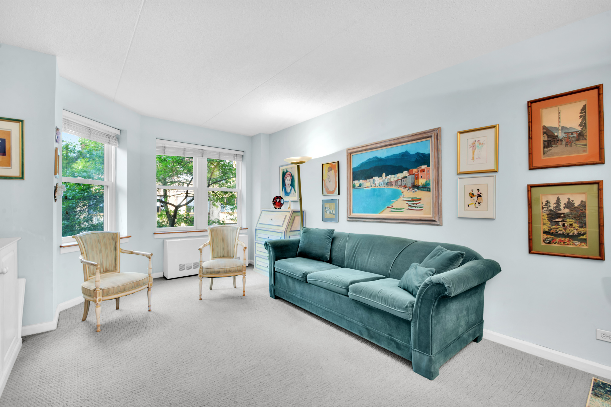 110 West 90th Street, Unit 3M Manhattan, NY 10024 - Photo 1 of 7 a living room with furniture and a large window
