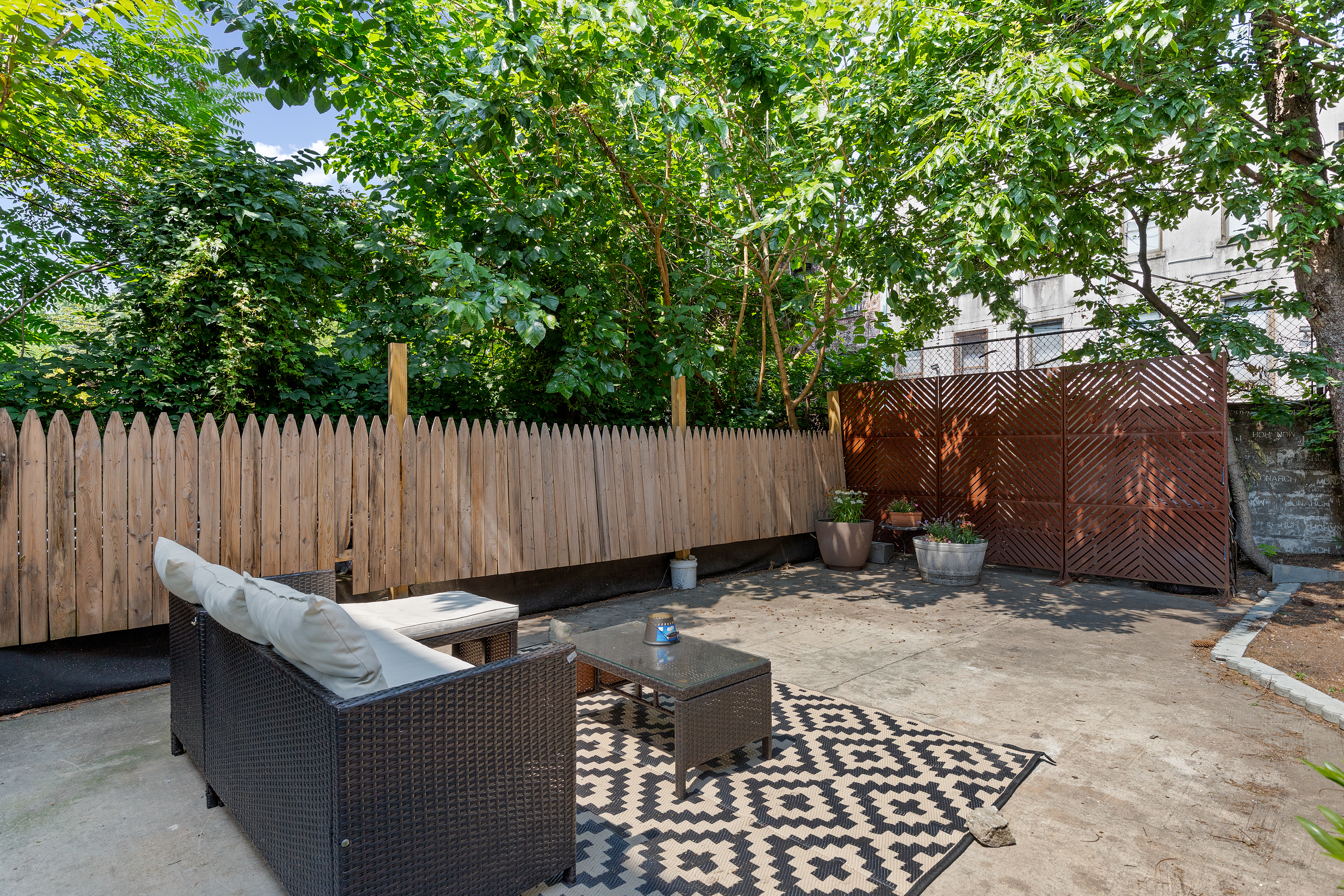 285 Weirfield Street Brooklyn, NY 11221 - Photo 7 of 16 an outdoor space with patio area and a couch