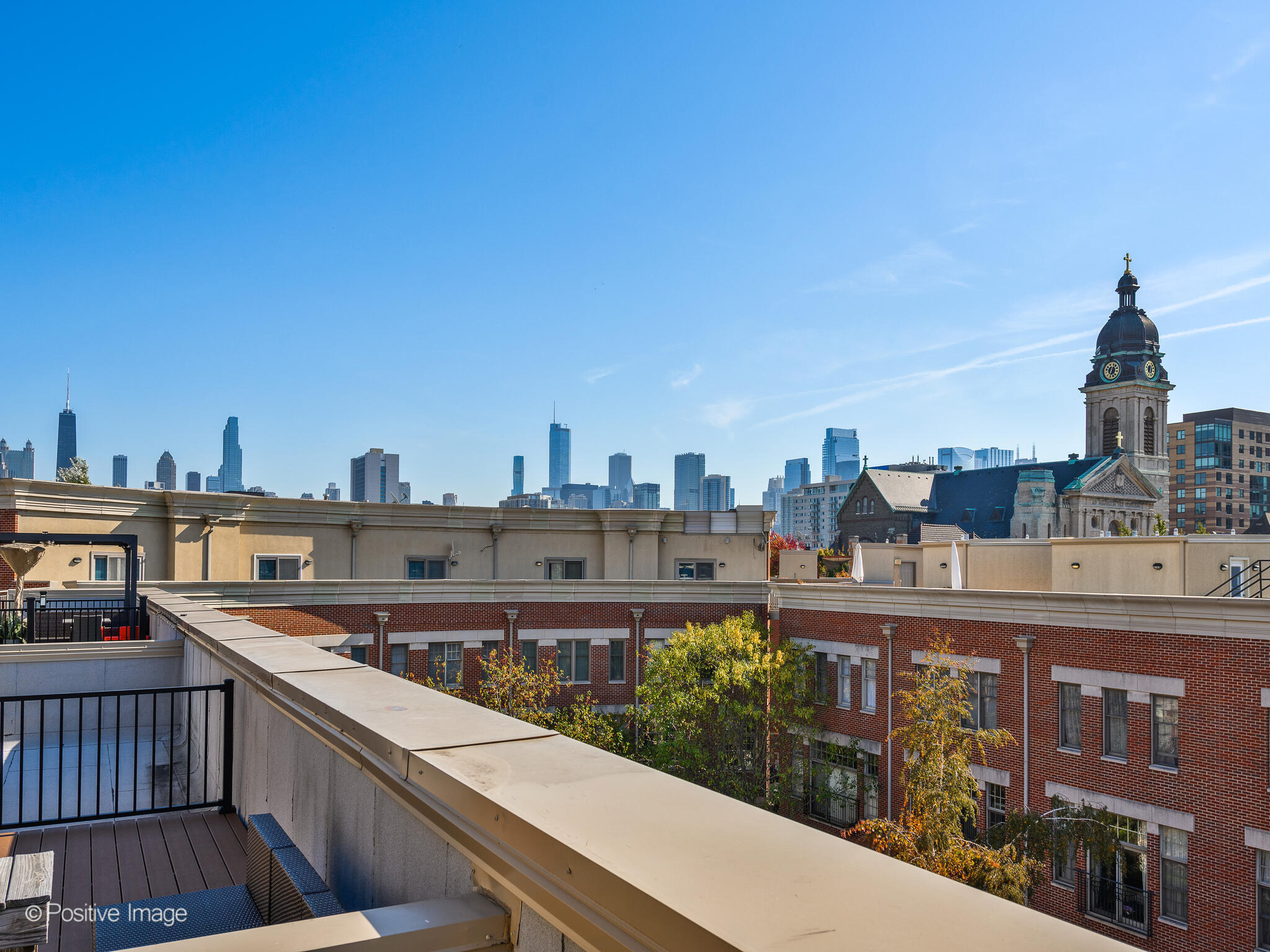 855 North May Street, Unit G Chicago, IL 60642 - Photo 26 of 28 a view of a city from a balcony