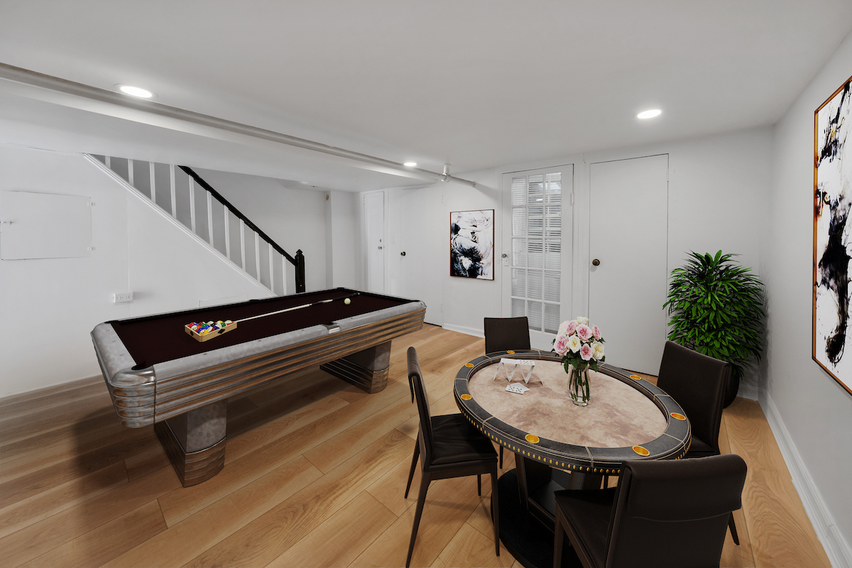 82-56 Eliot Avenue Queens, NY 11379 - Photo 6 of 7 a room with furniture and wooden floor