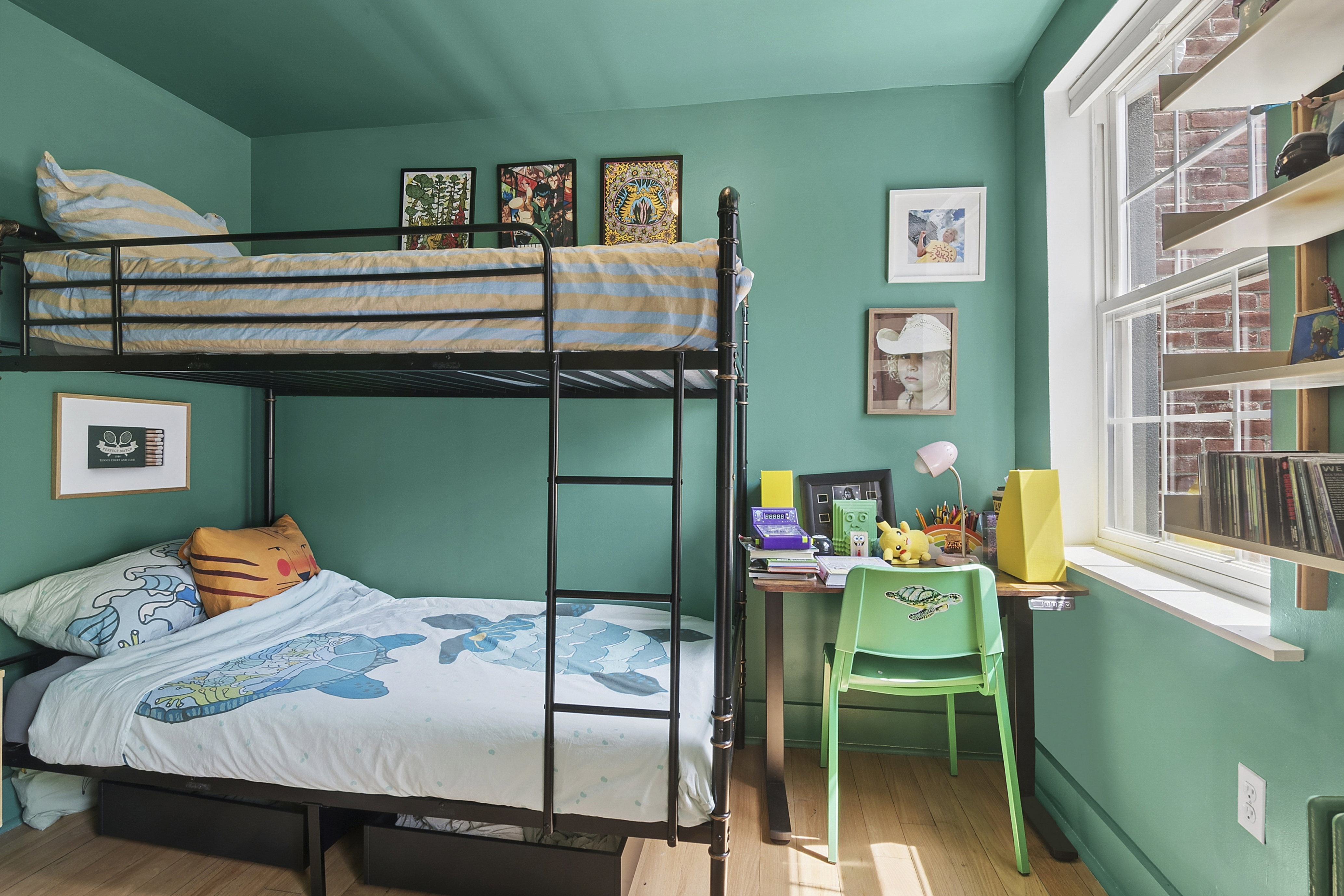 190 Concord Street Brooklyn, NY 11201 - Photo 11 of 14 a bedroom with furniture and a window