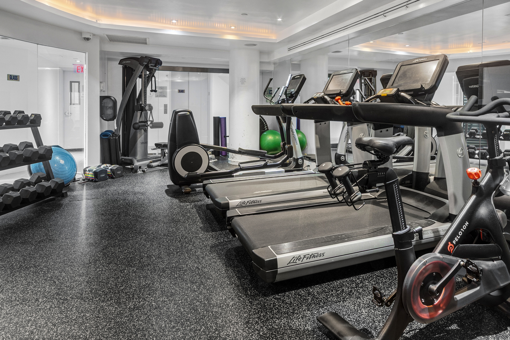 444 West 19th Street, Unit 701 Manhattan, NY 10011 - Photo 10 of 11 a view of a room with gym equipment