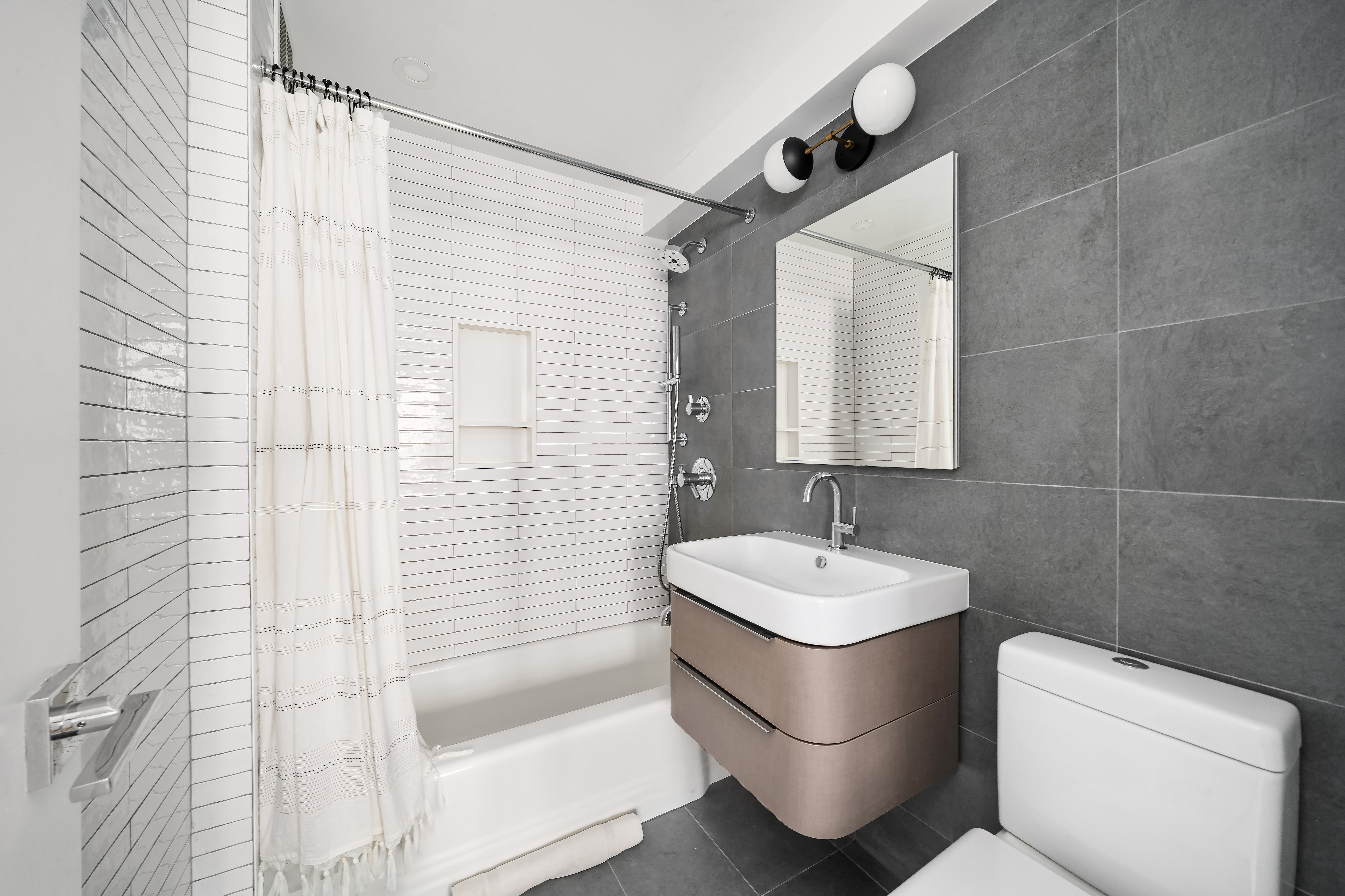 200 East 27th Street, Unit 7EF Manhattan, NY 10016 - Photo 10 of 13 a bathroom with a sink toilet and shower
