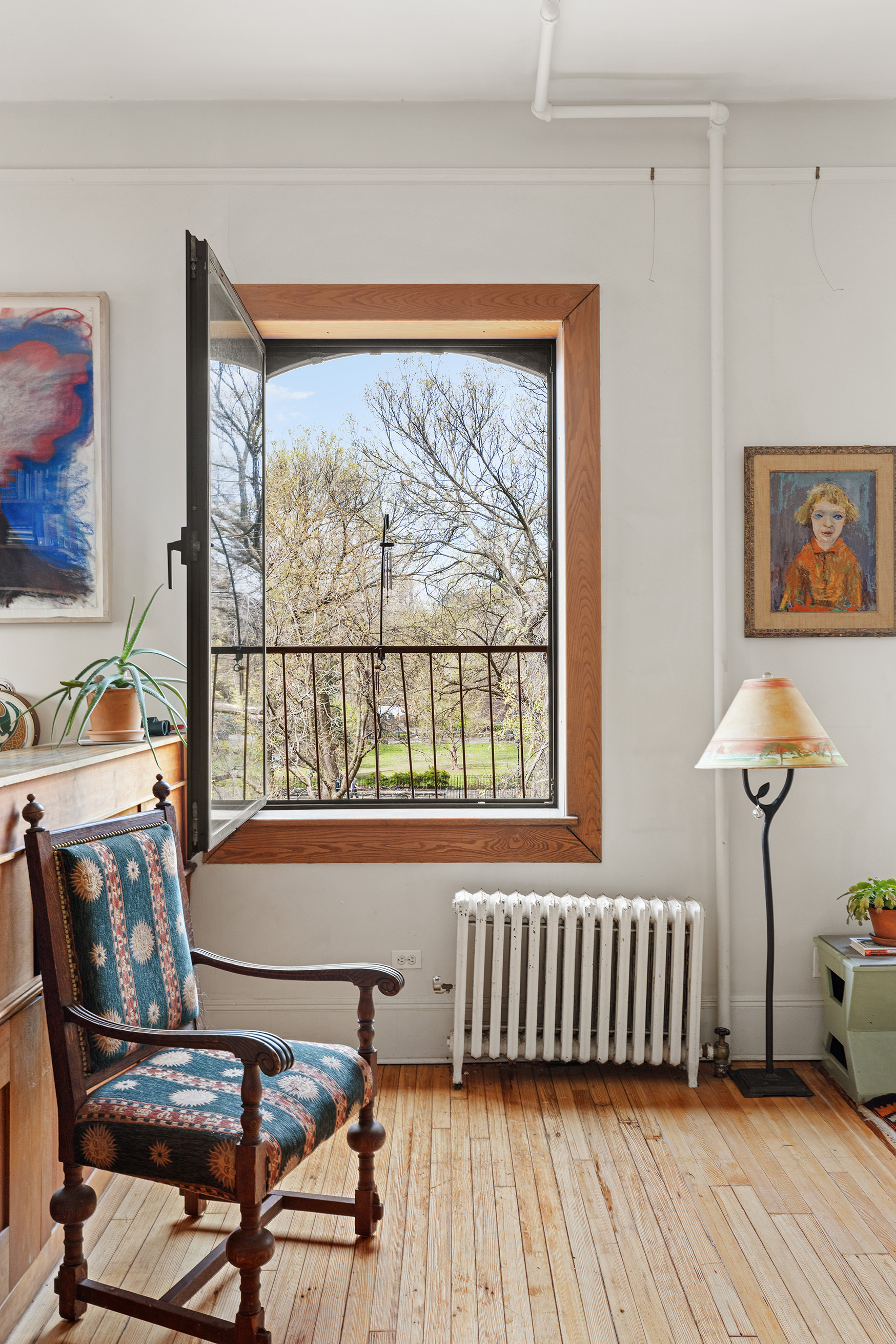 295 East 8th Street, Unit 3W Manhattan, NY 10009 - Photo 9 of 18 a view of a dining room with furniture window and outside view