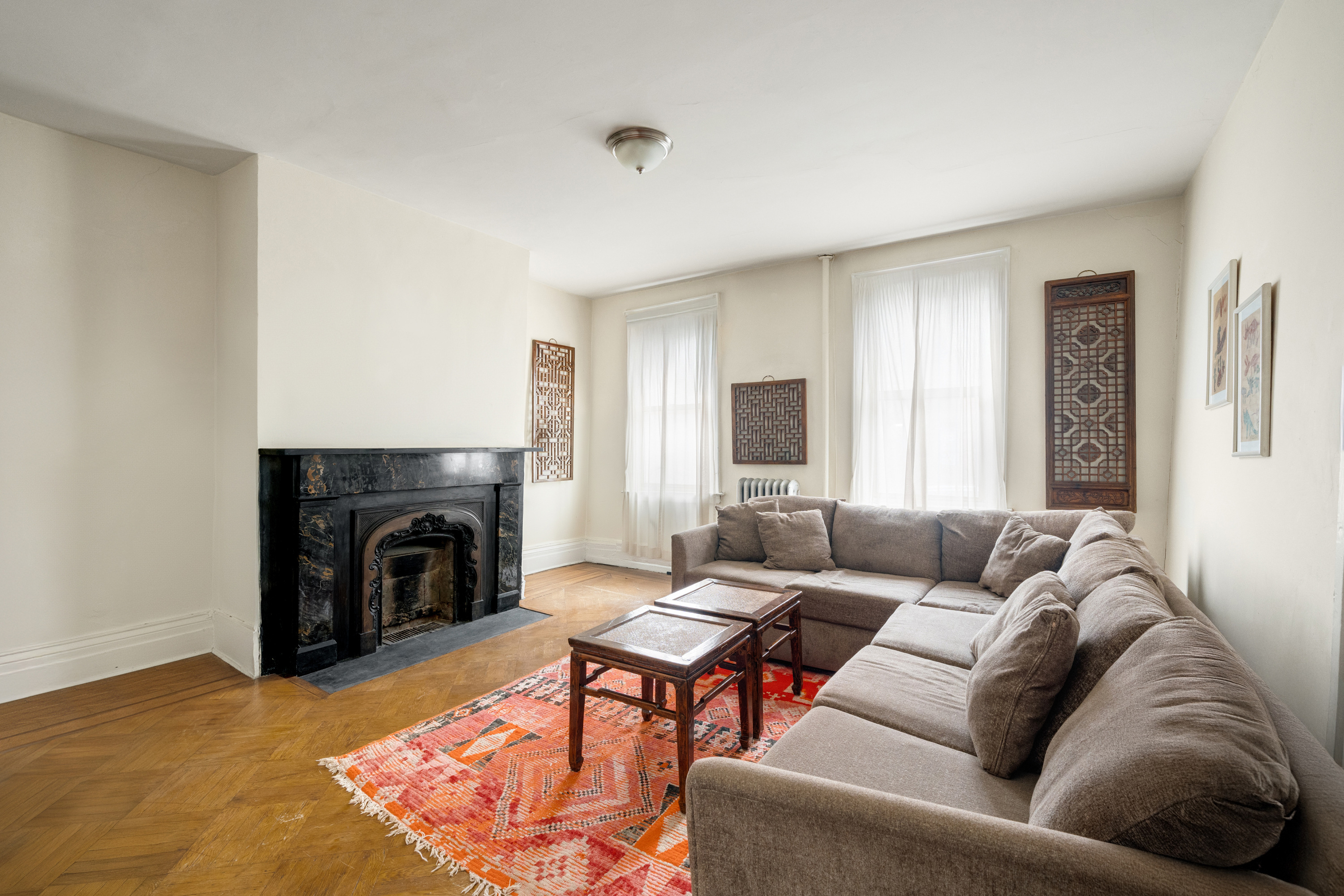 446 State Street Brooklyn, NY 11217 - Photo 4 of 23 a living room with furniture and a fireplace