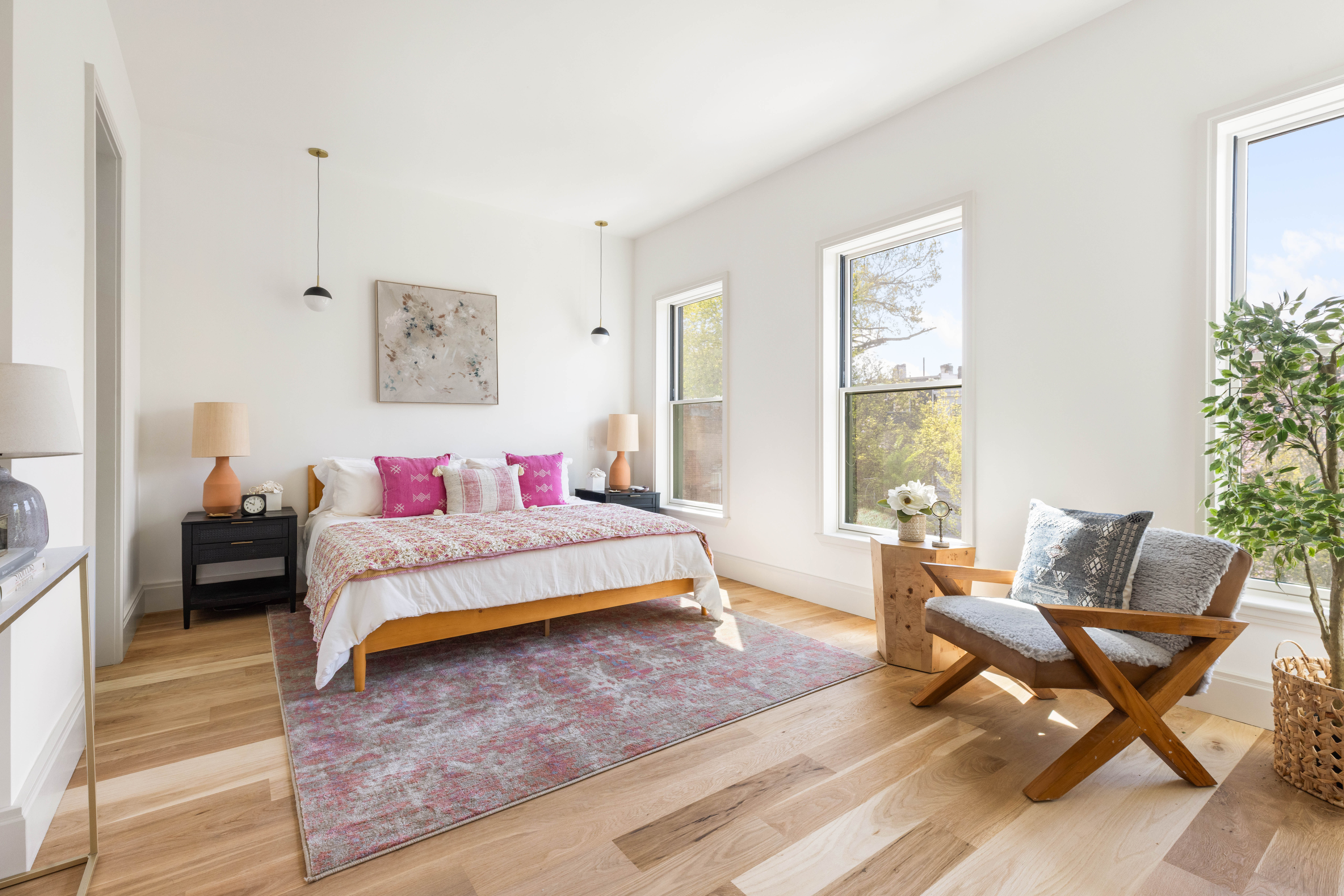 196 Monroe Street Brooklyn, NY 11216 - Photo 10 of 22 a bedroom with a bed and a chair