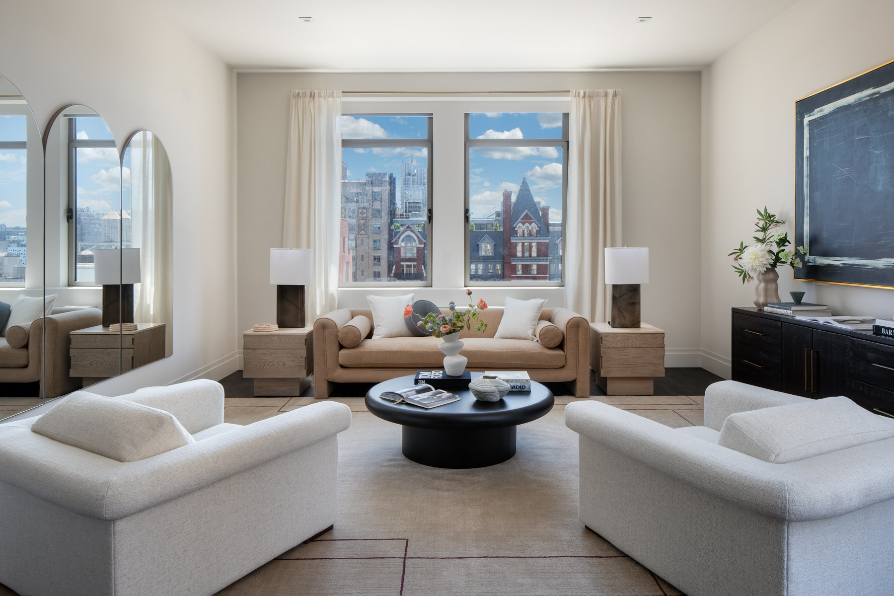 252 7th Avenue, Unit 10X Manhattan, NY 10001 - Photo 2 of 20 a living room with furniture and a large window