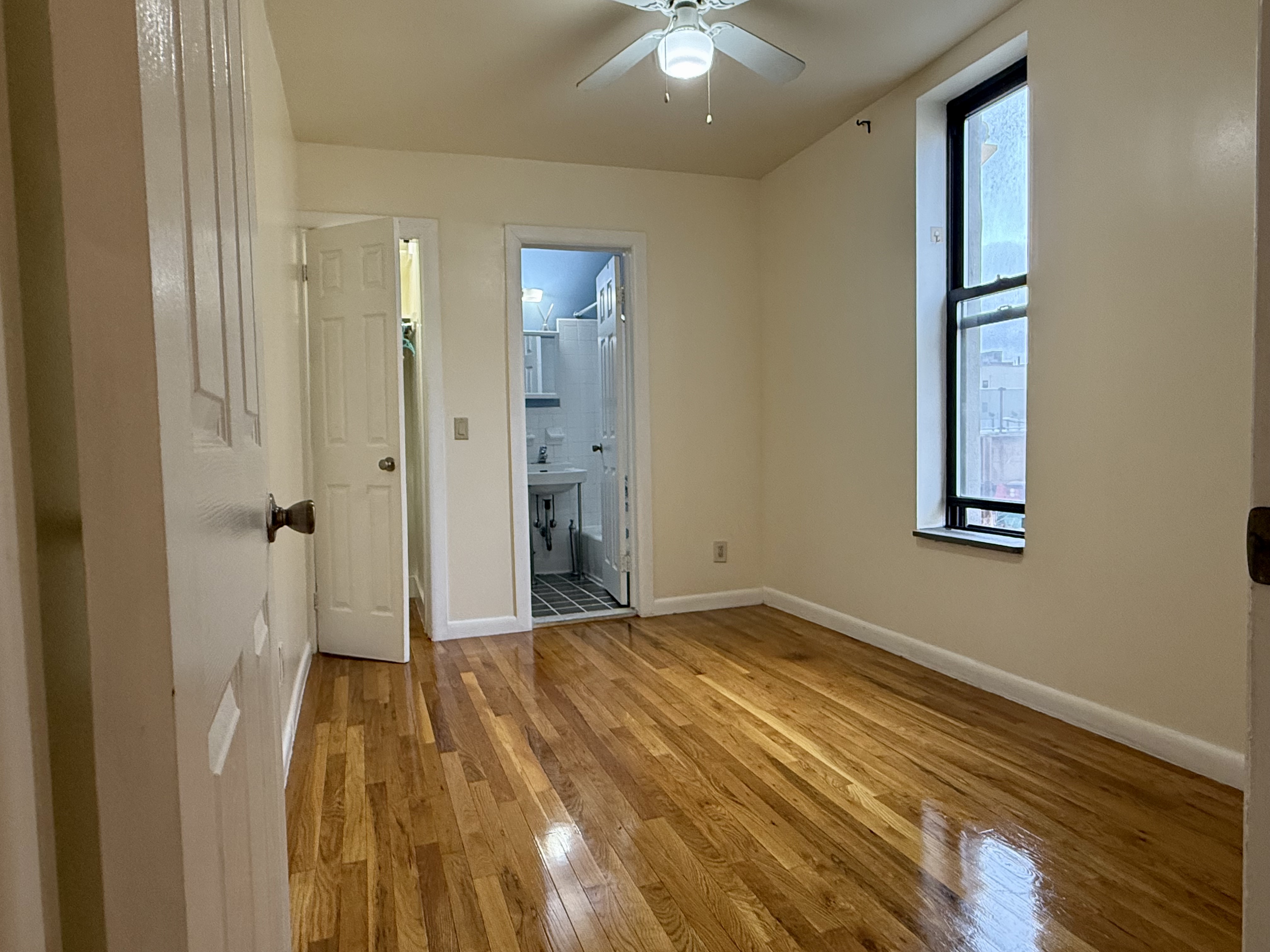 Park Avenue Manhattan, NY 10035 - Photo 7 of 14 a view of a room with wooden floor and bathroom