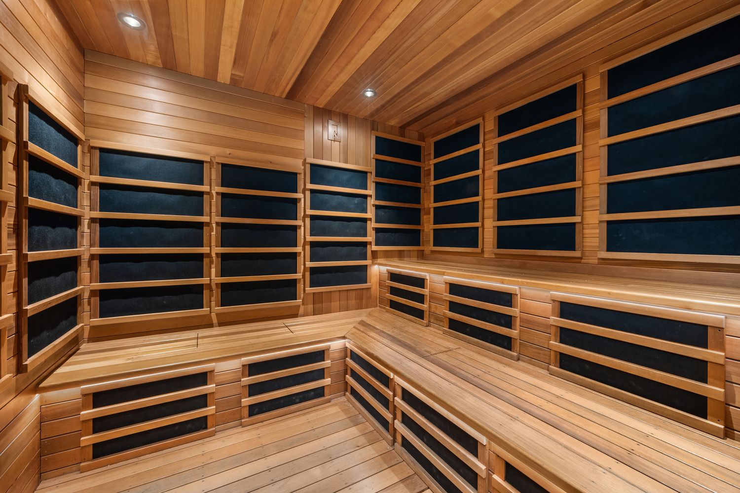 a view of walk in closet and empty room