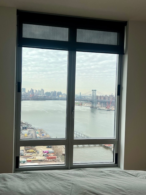 2 Northside Piers, Unit 26C Brooklyn, NY 11249 - Photo 5 of 21 a view of a lake from a window