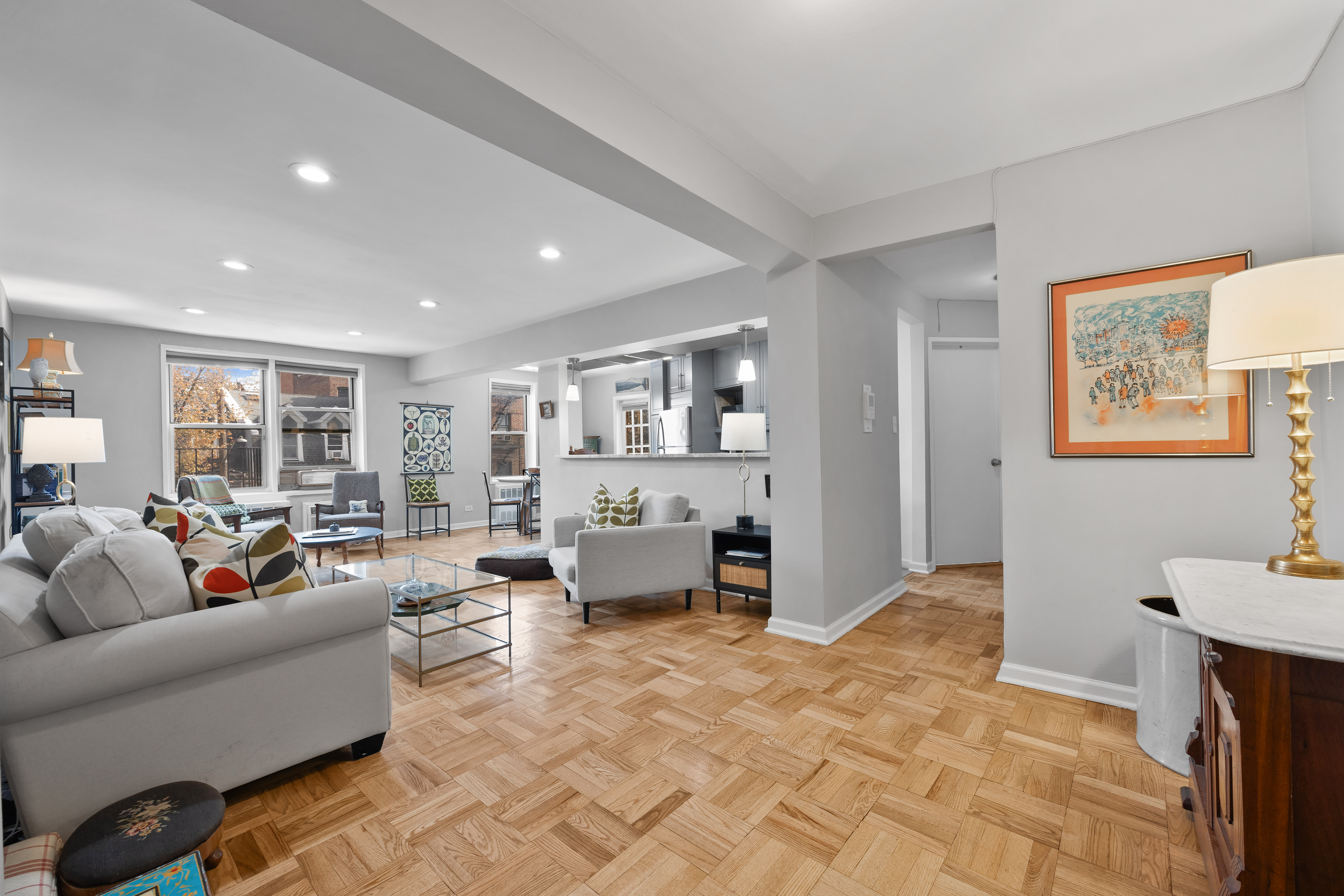 255 Fieldston Terrace, Unit 2L Bronx, NY 10471 - Photo 4 of 32 a living room with furniture and a table