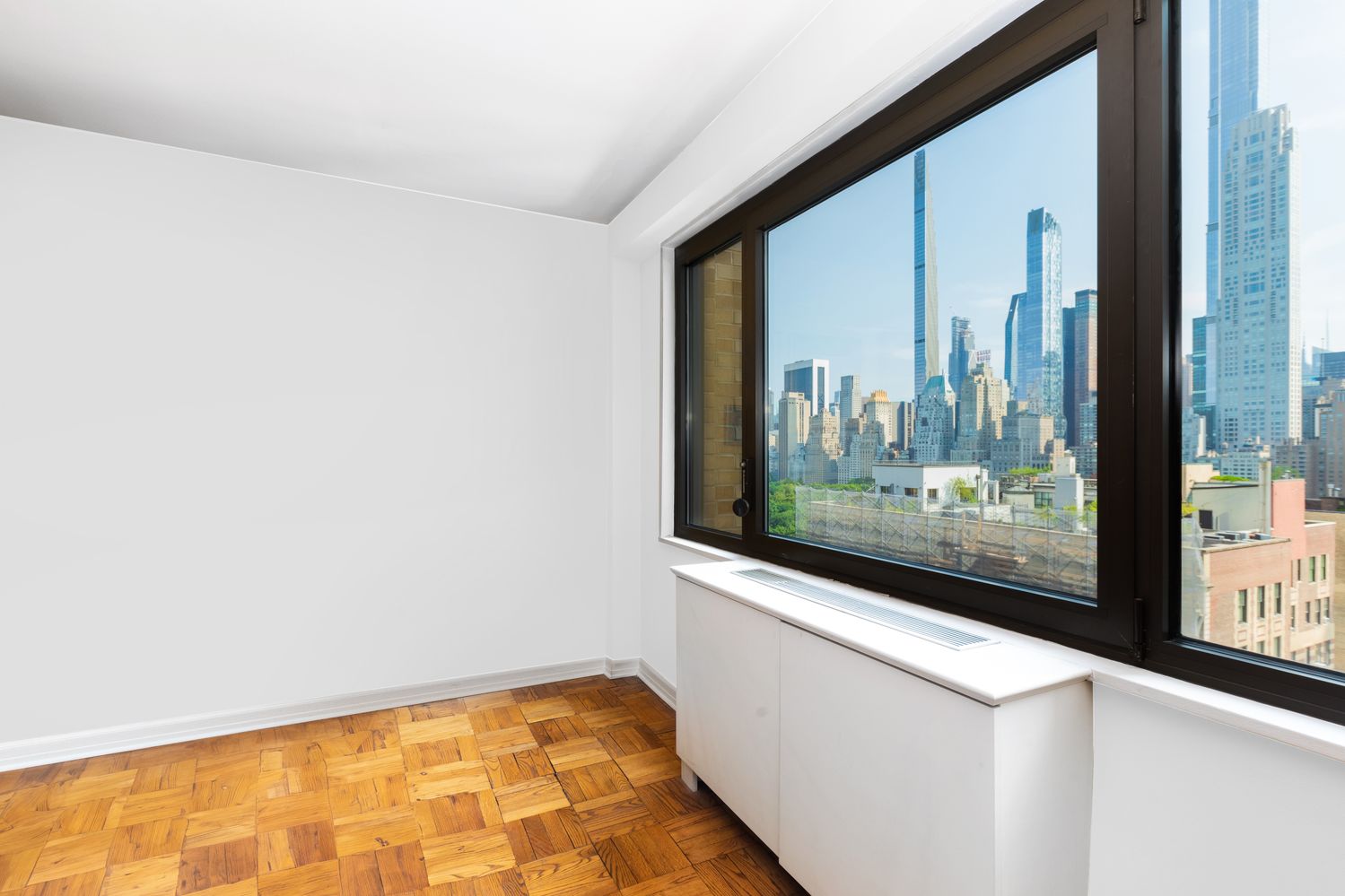 a view of a room with a large window