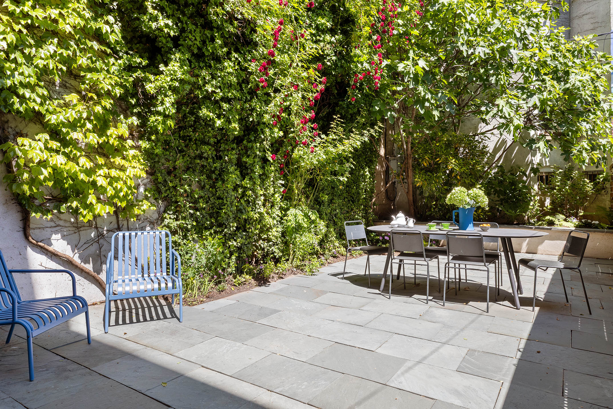 47 3rd Place Brooklyn, NY 11231 - Photo 10 of 20 a view of a patio with a table and chairs and potted plants