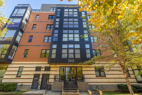 a view of a hallway with closet