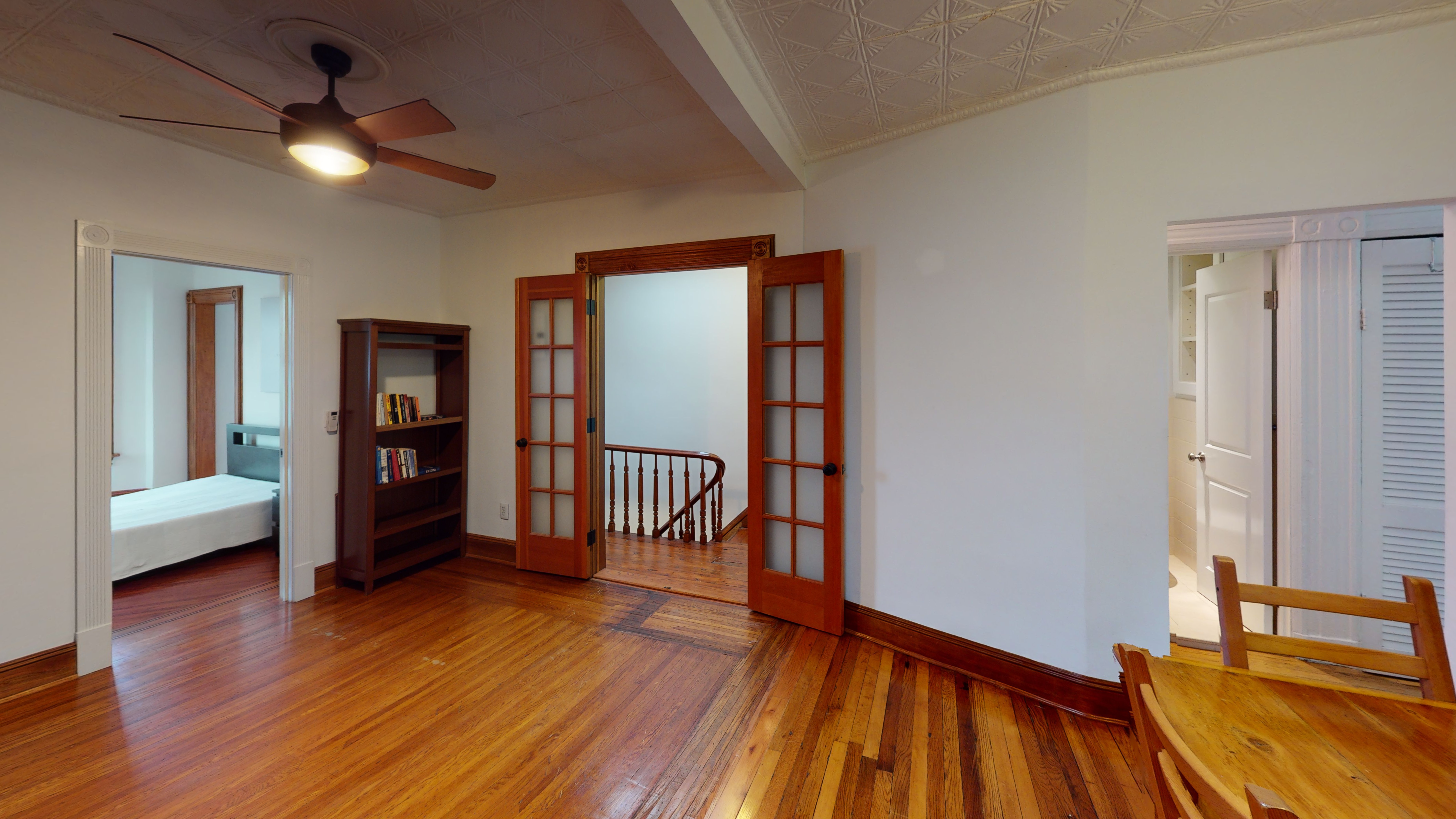 332 15th Street, Unit 3 Brooklyn, NY 11215 - Photo 5 of 8 a view of a livingroom with wooden floor and a ceiling fan