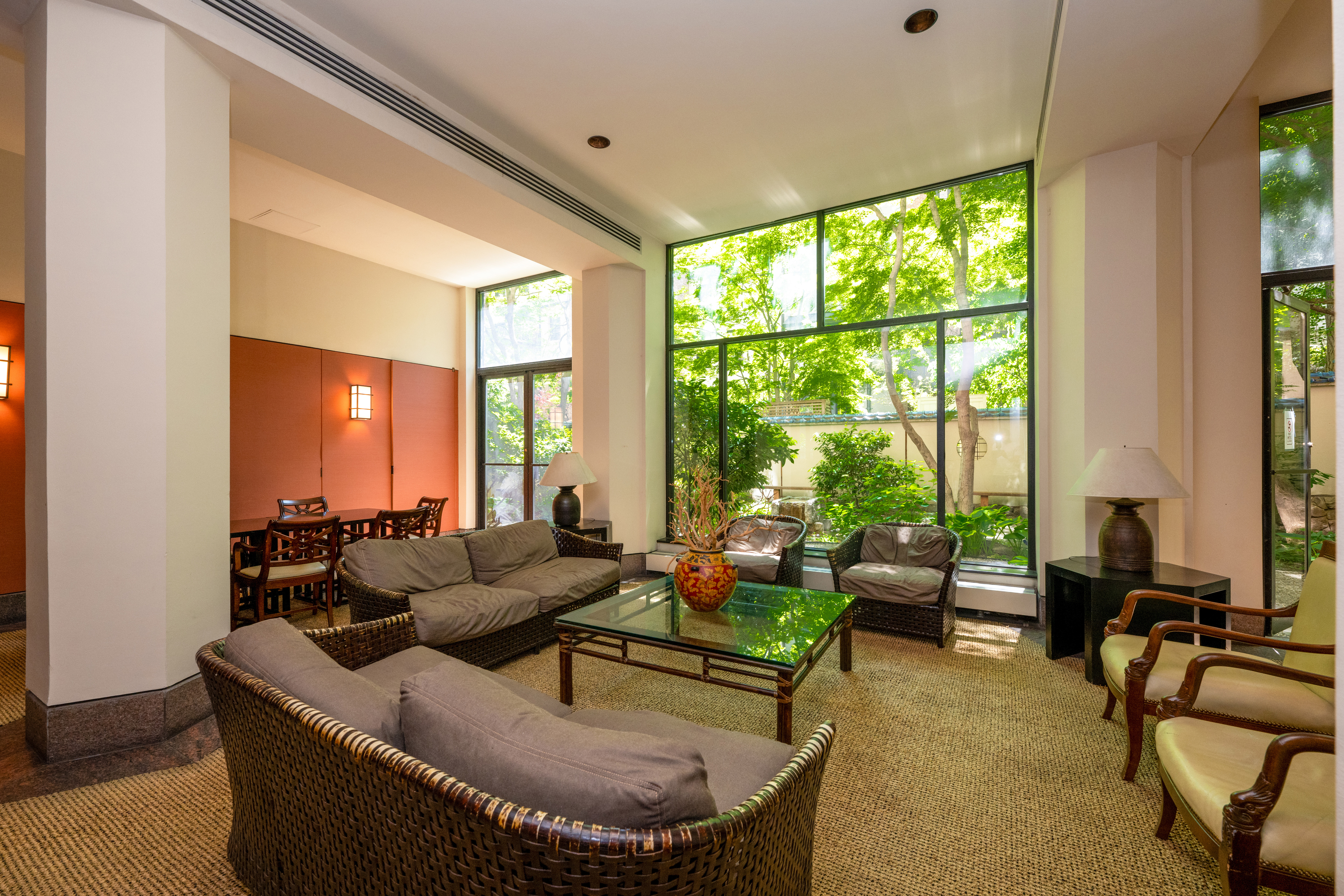 124 East 79th Street, Unit 7D Manhattan, NY 10075 - Photo 23 of 25 a living room with furniture and a large window