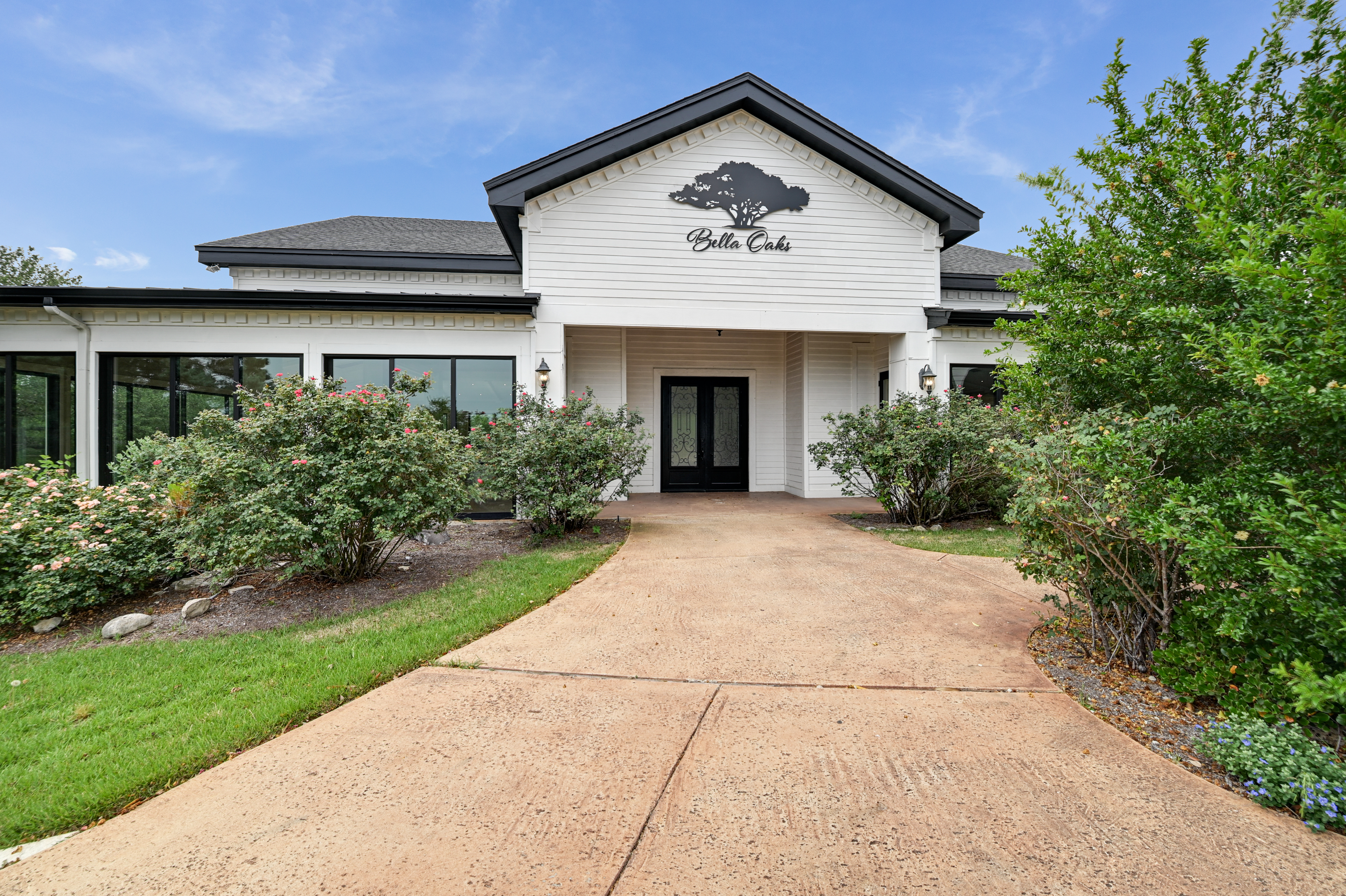 14913 Murfin Road Austin, TX 78734 - Photo 3 of 40 a view of a house with garden and garage