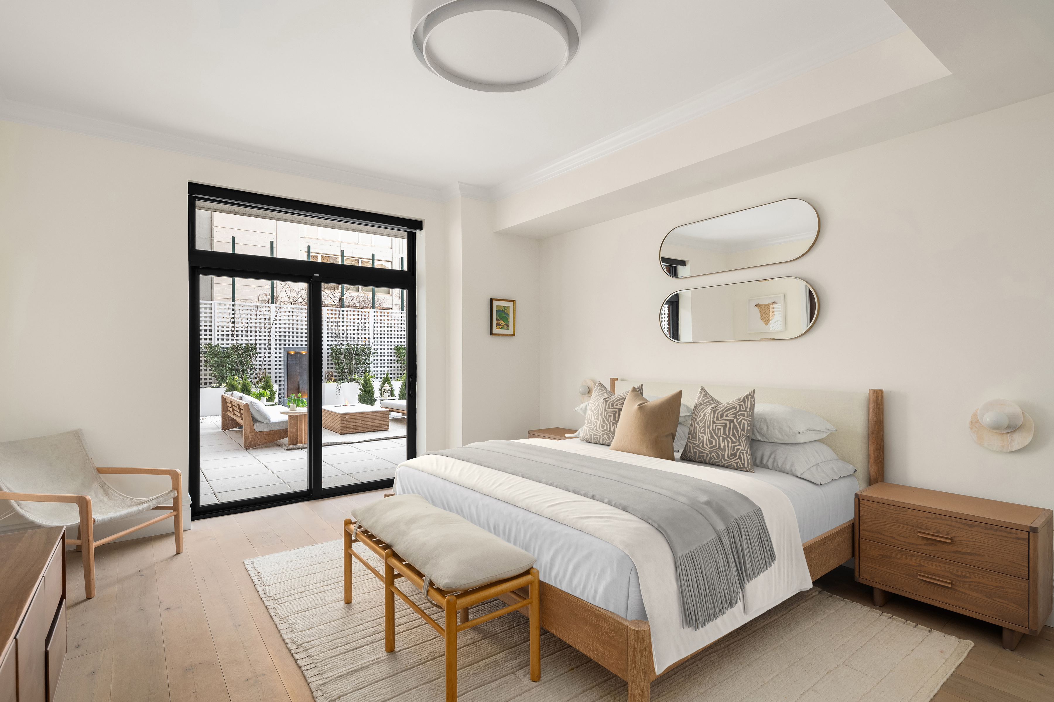 199 Mott Street, Unit 2 Manhattan, NY 10012 - Photo 10 of 14 a bedroom with a bed and window