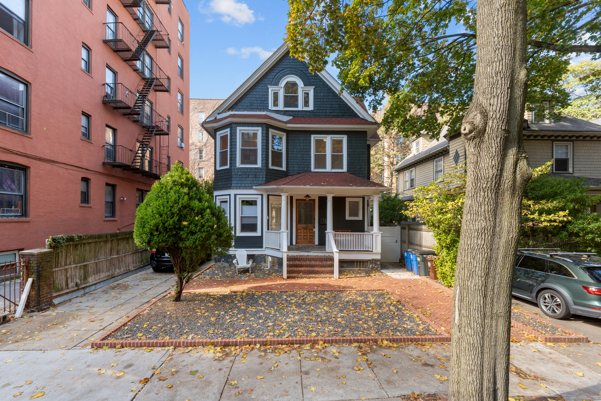 a front view of a house with garden