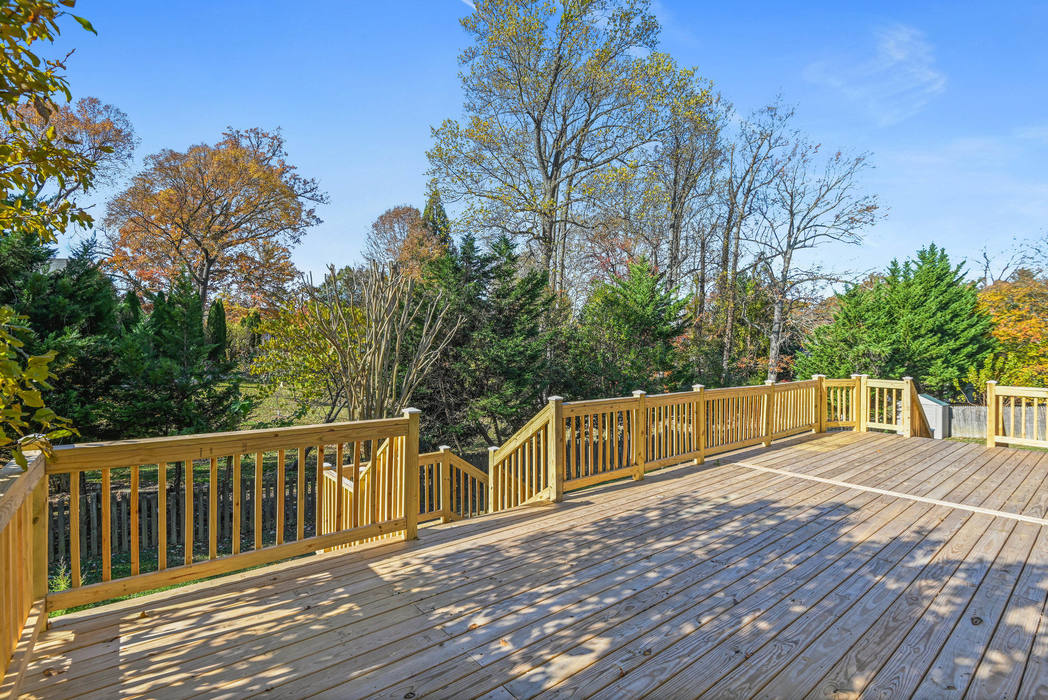 2628 Five Oaks Road Vienna, VA 22181 - Photo 35 of 40 a view of balcony with wooden floor and fence