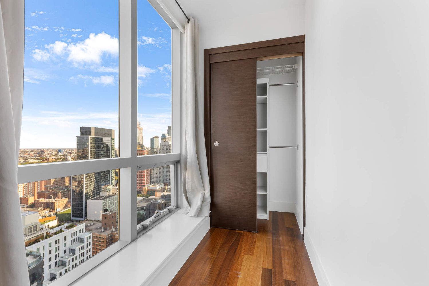 150 Myrtle Avenue, Unit PH3201 Brooklyn, NY 11201 - Photo 21 of 40 a view of a balcony with wooden floor