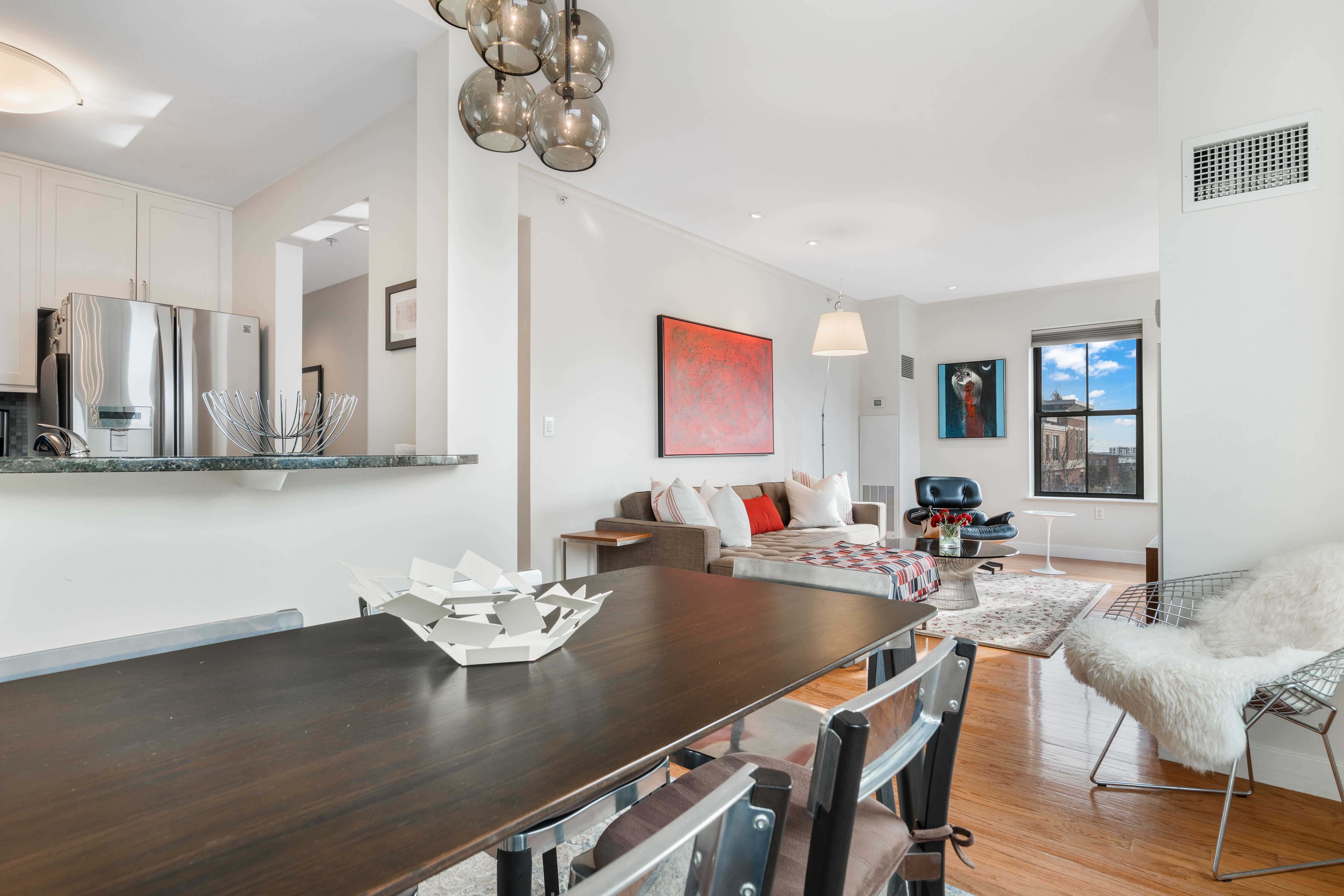 2 Rollins Street, Unit D601 Boston, MA 02118 - Photo 12 of 29 a view of a dining room with furniture