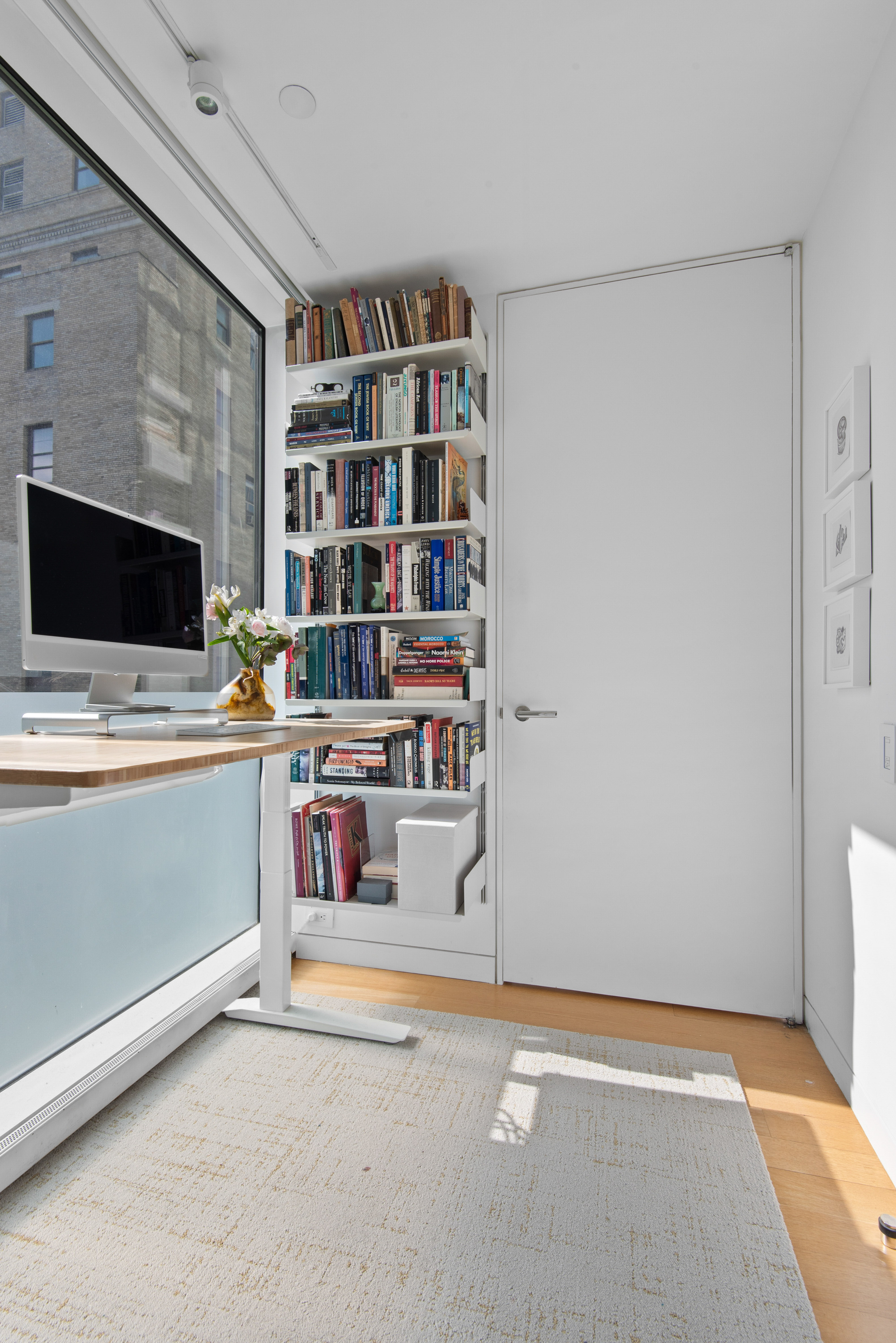 1 Grand Army Plaza, Unit 4B Brooklyn, NY 11238 - Photo 5 of 20 a workspace with a bookshelf
