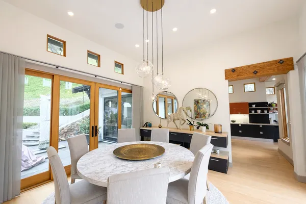 a view of a dining room with furniture window and outside view