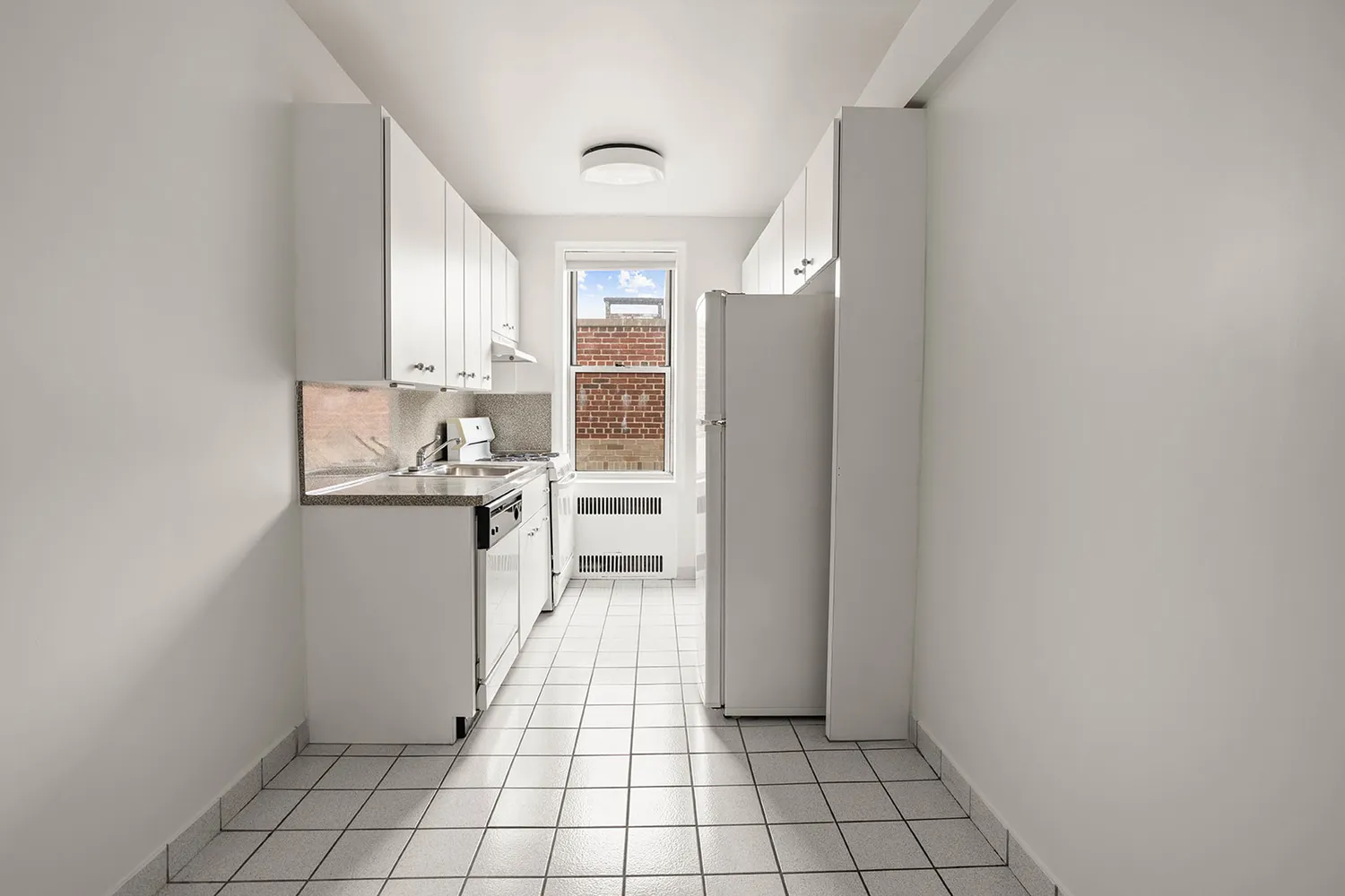 a view of kitchen with windows