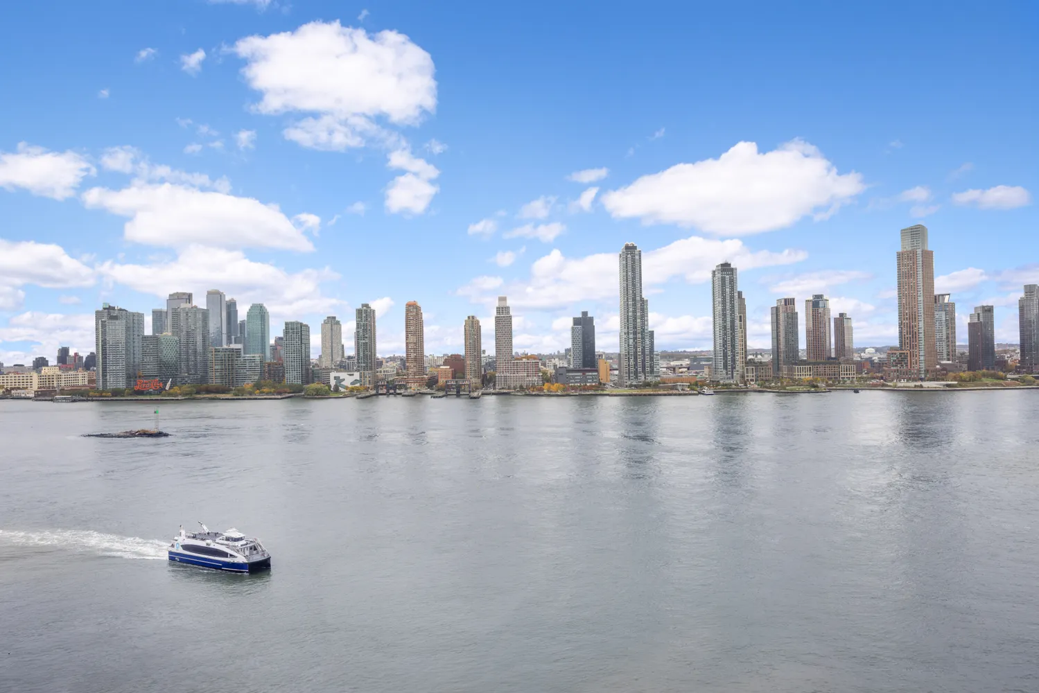 a view of a city with tall buildings